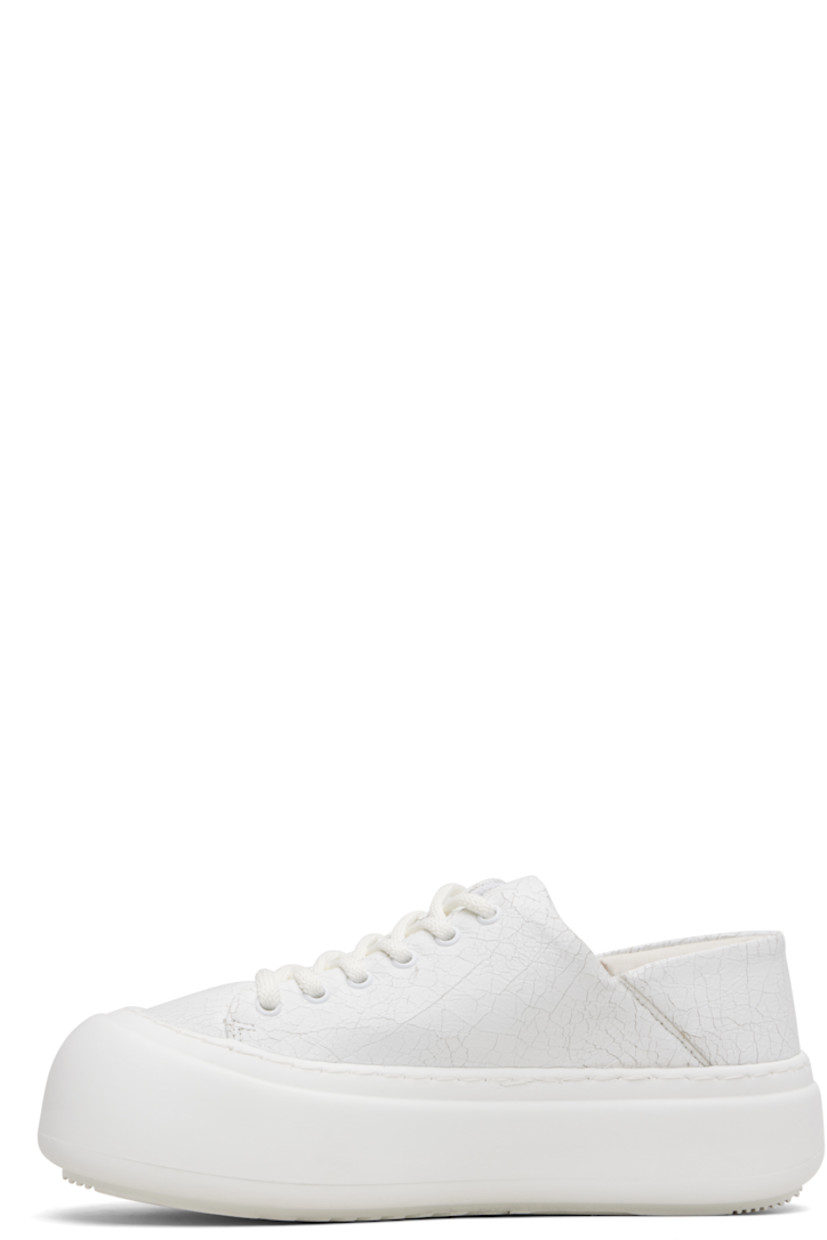 Low-top cracked faux-leather sneakers.

· Lace-up closure
· Padded tongue and collar
· Mesh lining
· Logo-embossed rubber platform midsole
· Treaded rubber sole
· Platform: H1.75"

Supplier color: Cracked white