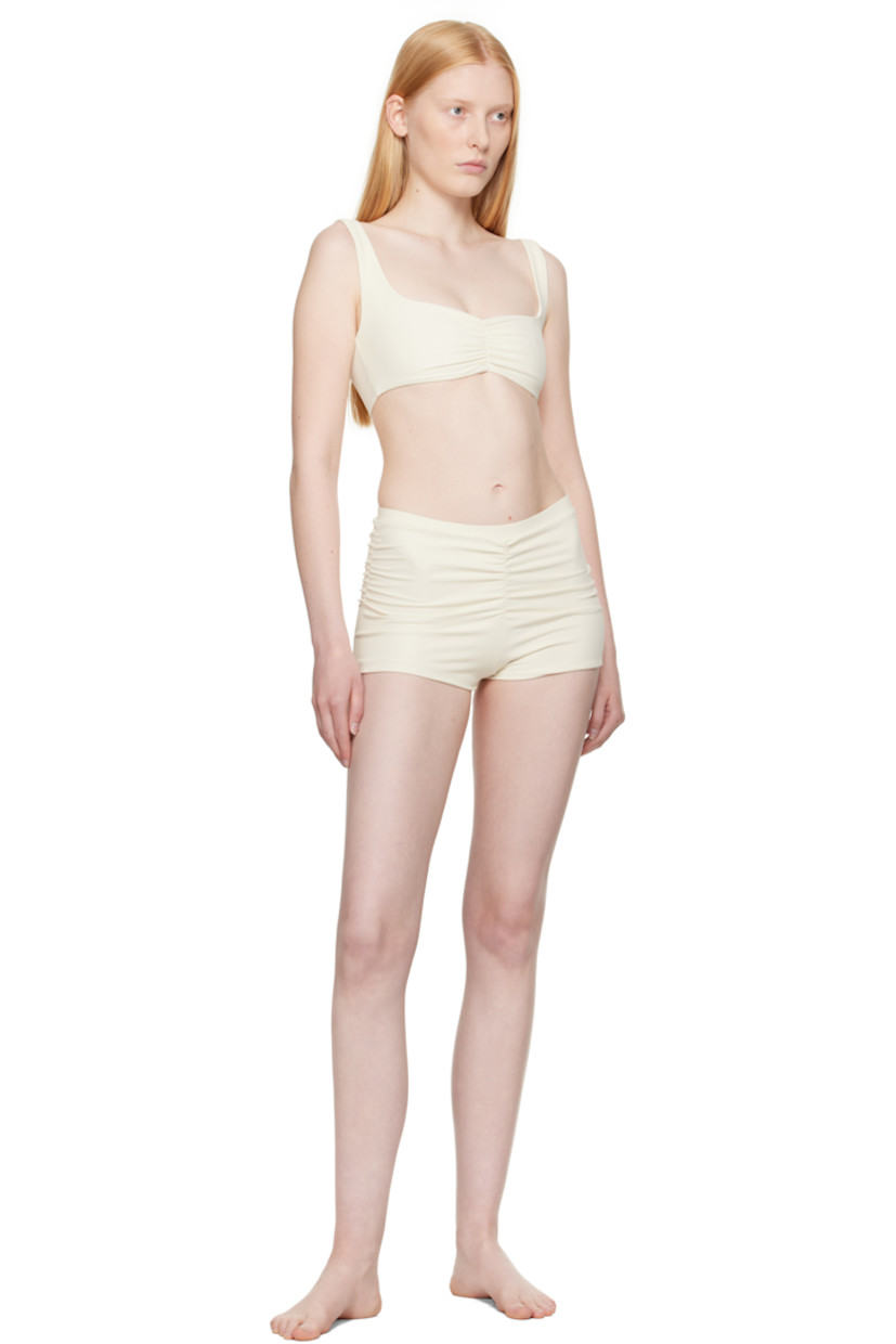 Stretch nylon ribbed jersey bikini bottom. Ruching throughout. 

· Elasticized waistband
· Full jersey lining

Supplier color: Cream rib