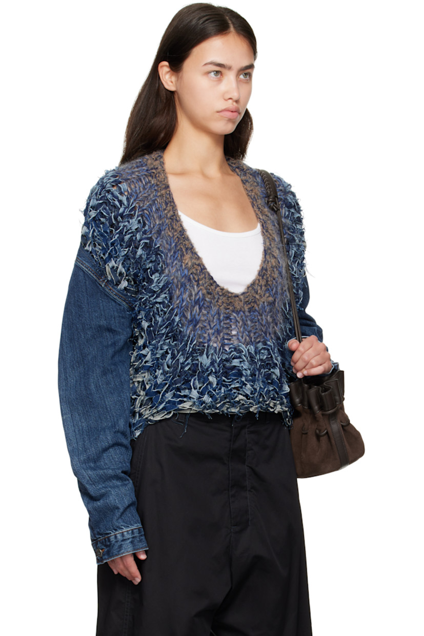 Non-stretch denim and rib-knit virgin wool jacket.

· Braided detailing throughout
· Paneled construction
· Scoop neck
· Buttoned barrel cuffs
· Adjustable button tabs at back hem

Supplier color: Vintage blue