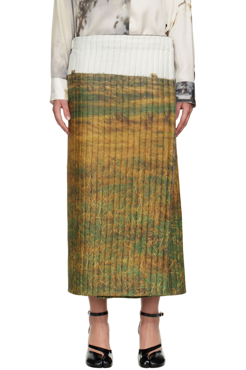 Padded and quilted plain-woven cotton midi skirt.

· Graphic printed throughout
· Wrap construction
· Elasticized waistband
· Press-stud closure
· Logo hardware at back waistband
· Full quilted wool melton lining

Supplier color: Sheep print/Mohair