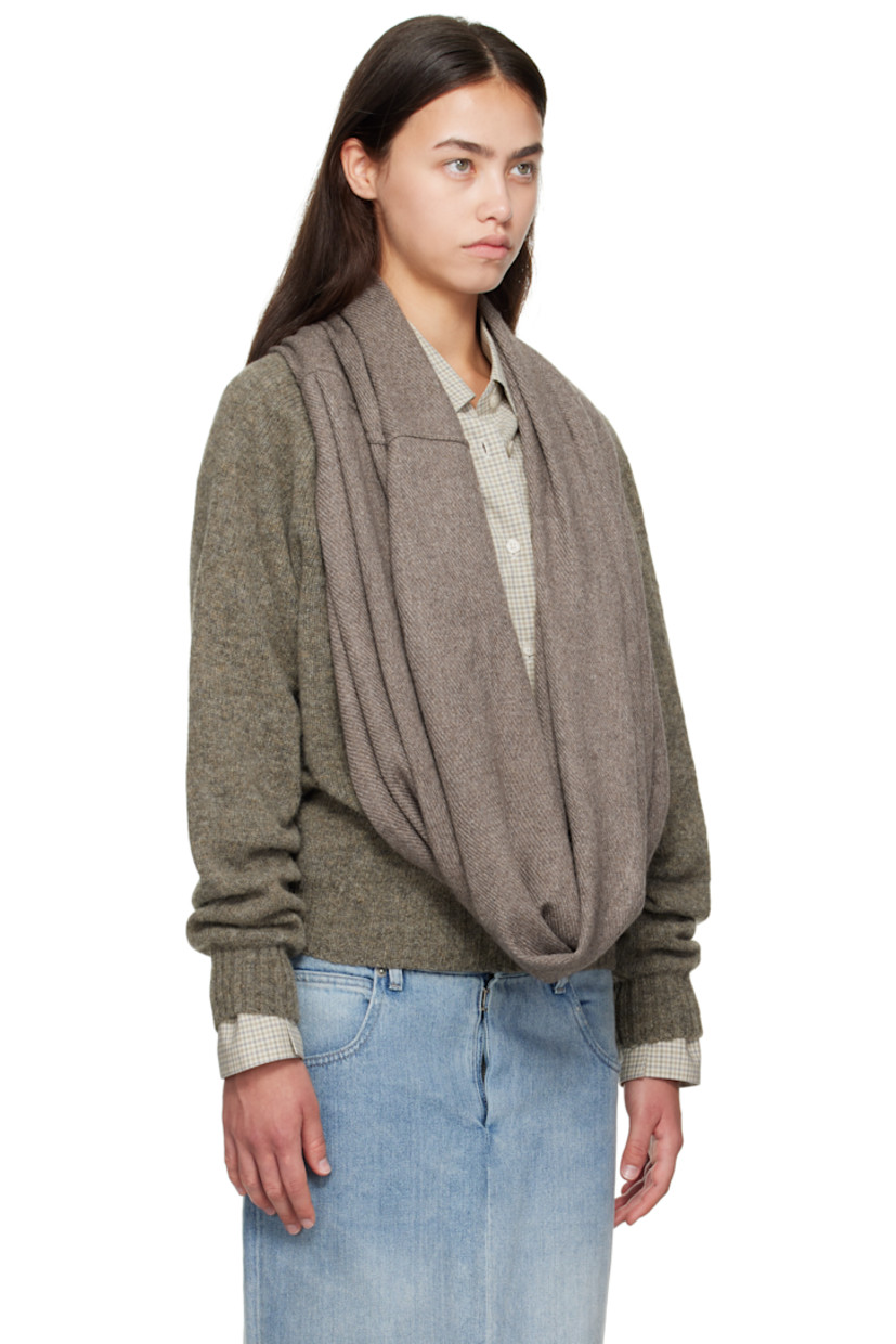 Knit Shetland wool sweater.

· Modified plunging cowl neck
· Logo stud at front
· Rib knit hem and cuffs

Supplier color: Brown/Brown