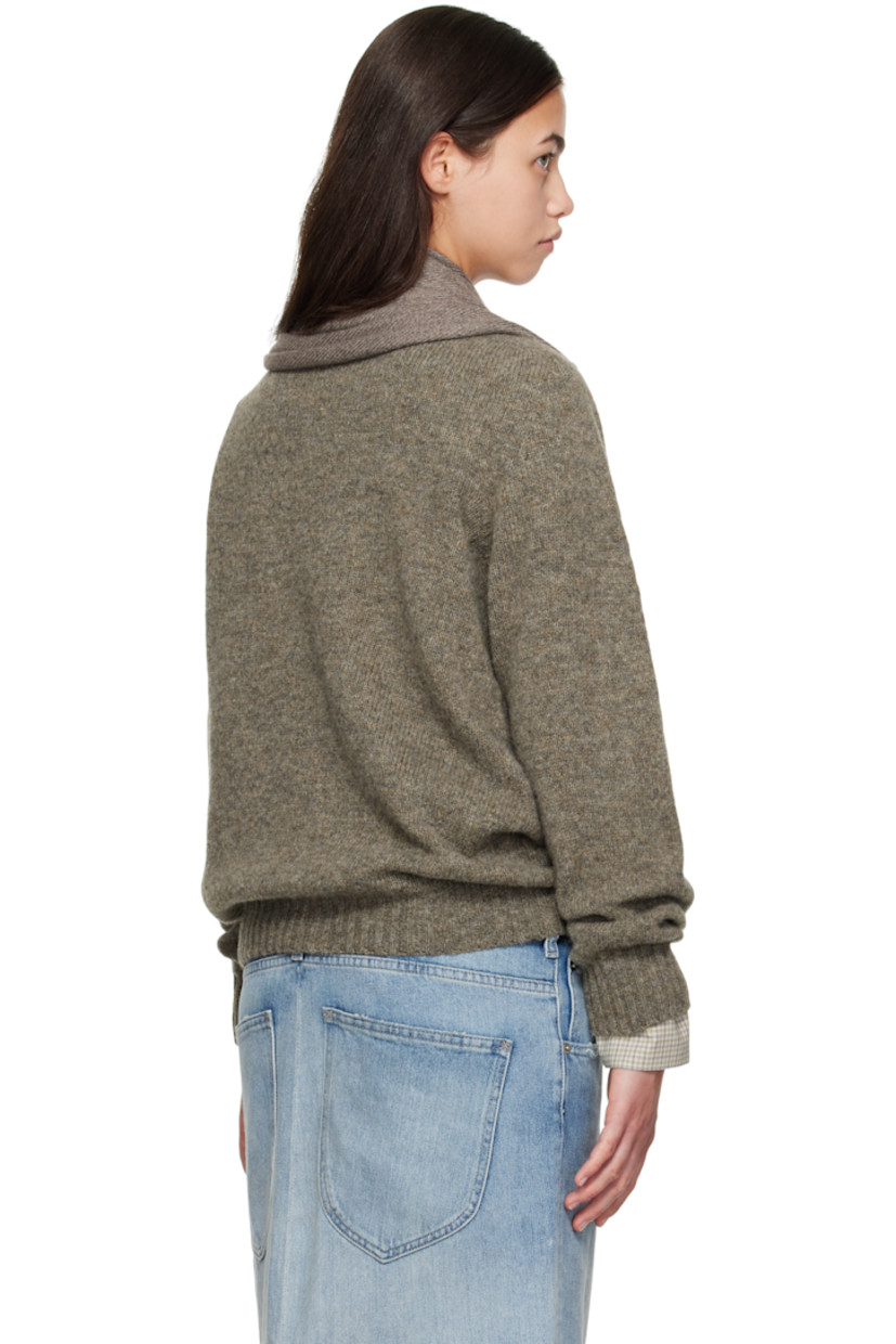 Knit Shetland wool sweater.

· Modified plunging cowl neck
· Logo stud at front
· Rib knit hem and cuffs

Supplier color: Brown/Brown