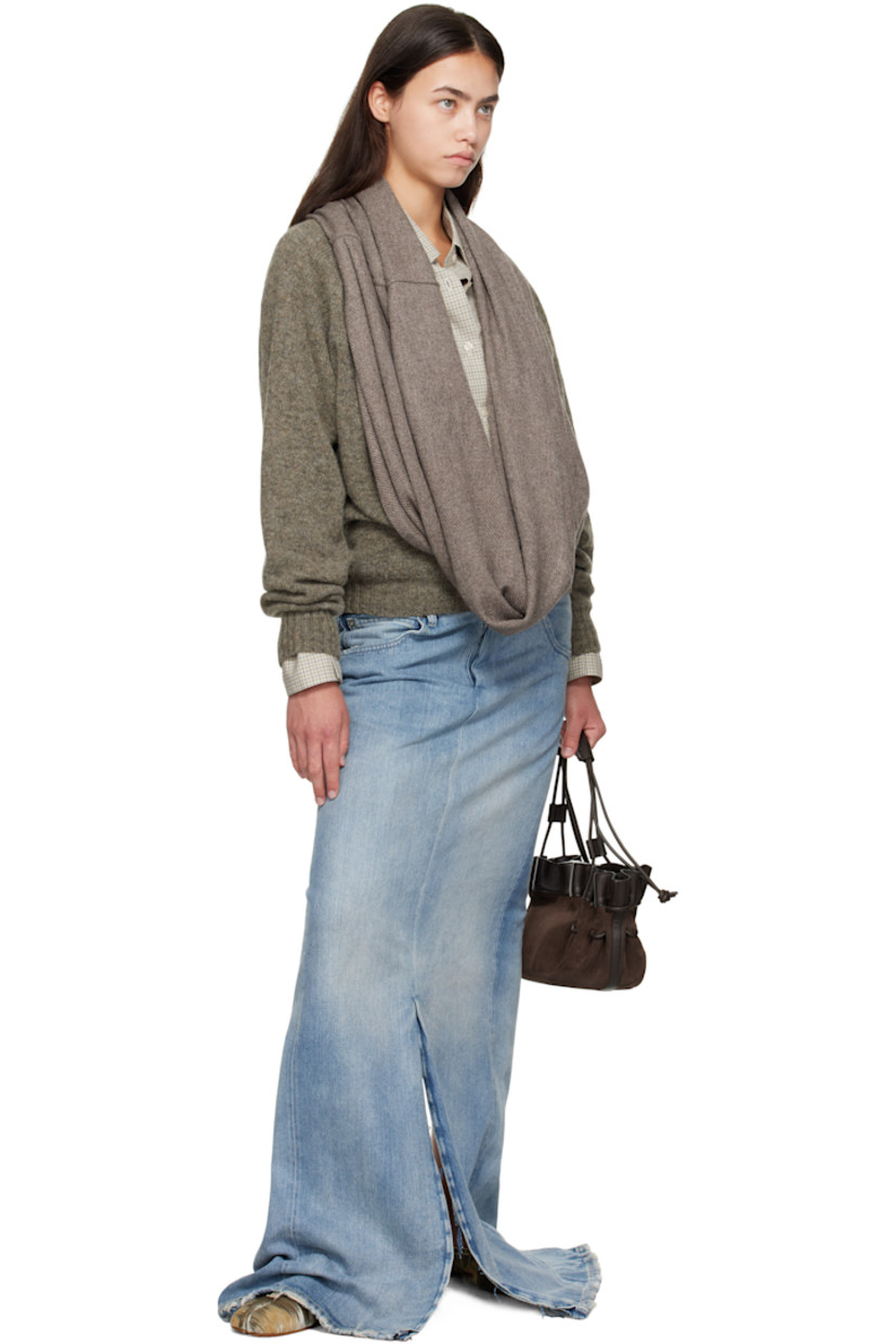 Knit Shetland wool sweater.

· Modified plunging cowl neck
· Logo stud at front
· Rib knit hem and cuffs

Supplier color: Brown/Brown