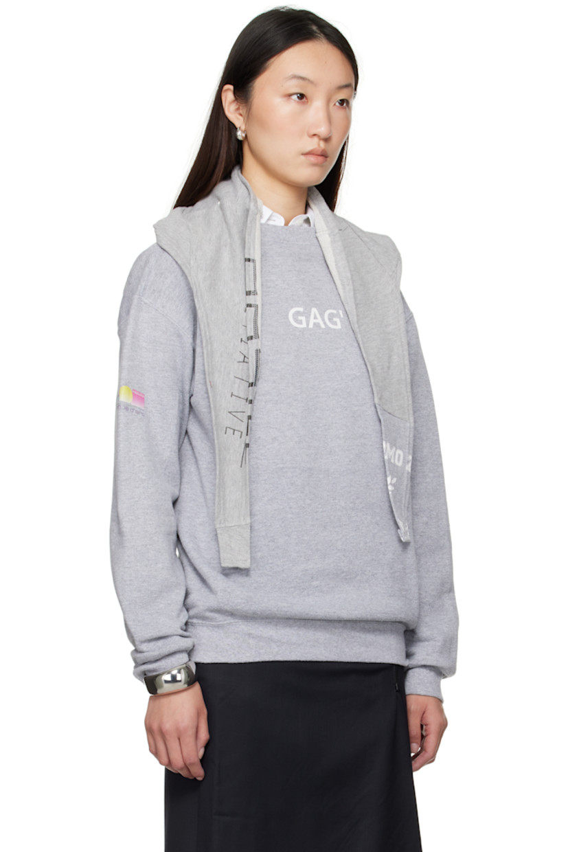 Cotton-blend French terry sweatshirt. 

· Text and graphic printed throughout 
· Integrated self-tie trim at rib-knit crewneck
· Rib-knit hem and cuffs
· Dropped shoulders

Each item is constructed using upcycled garments. Please note colorways and graphics may vary.

Supplier color: Multicolor