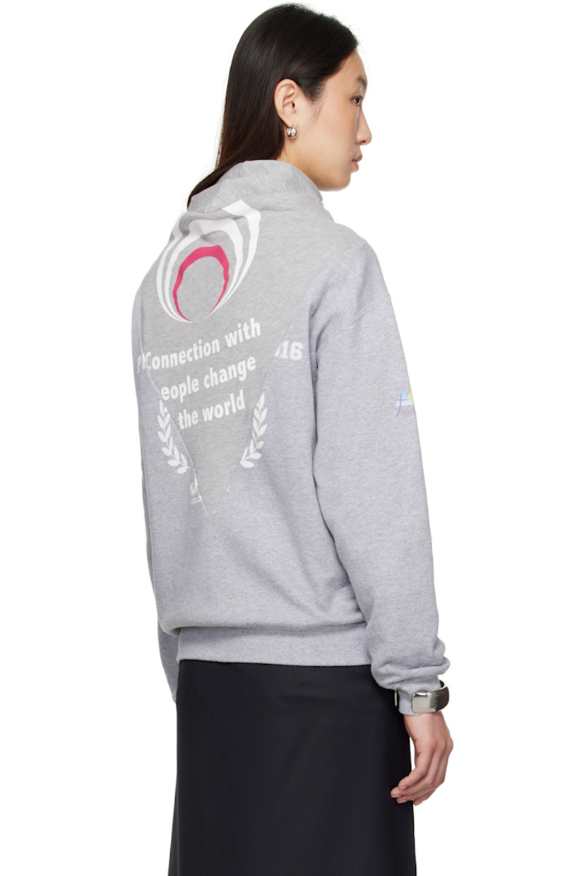 Cotton-blend French terry sweatshirt. 

· Text and graphic printed throughout 
· Integrated self-tie trim at rib-knit crewneck
· Rib-knit hem and cuffs
· Dropped shoulders

Each item is constructed using upcycled garments. Please note colorways and graphics may vary.

Supplier color: Multicolor