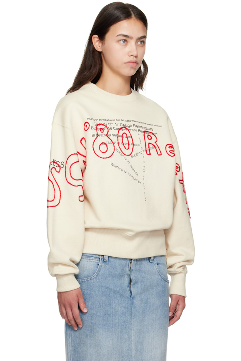 Cotton fleece sweatshirt.

· Logo and text embroidered throughout
· Rib-knit crewneck, hem, and cuffs
· Logo and text printed at front and sleeves
· Logo hardware at side seam

Supplier color: Ecru