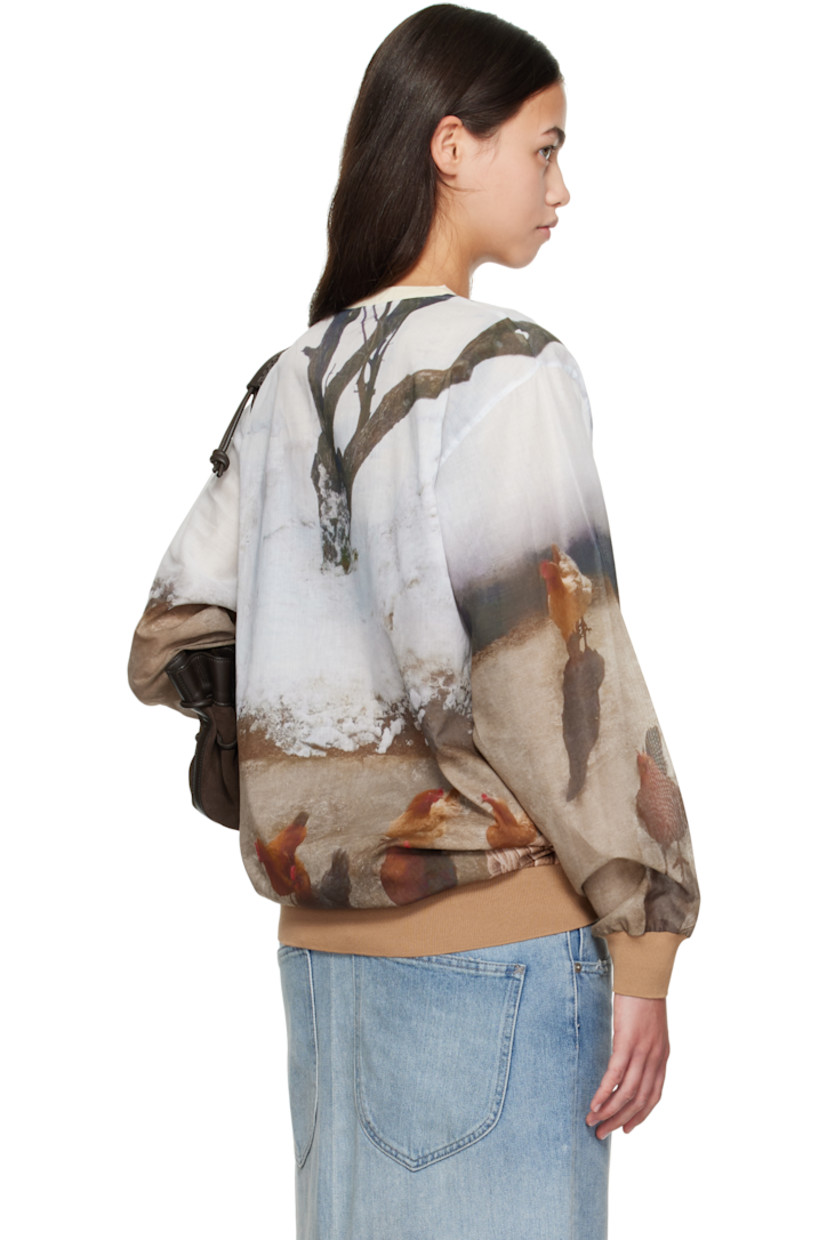 Semi-sheer cotton-blend poplin T-shirt.

· Graphic pattern printed throughout
· Rib-knit crewneck, hem, and cuffs
· Logo disc at side seam

Supplier color: Print