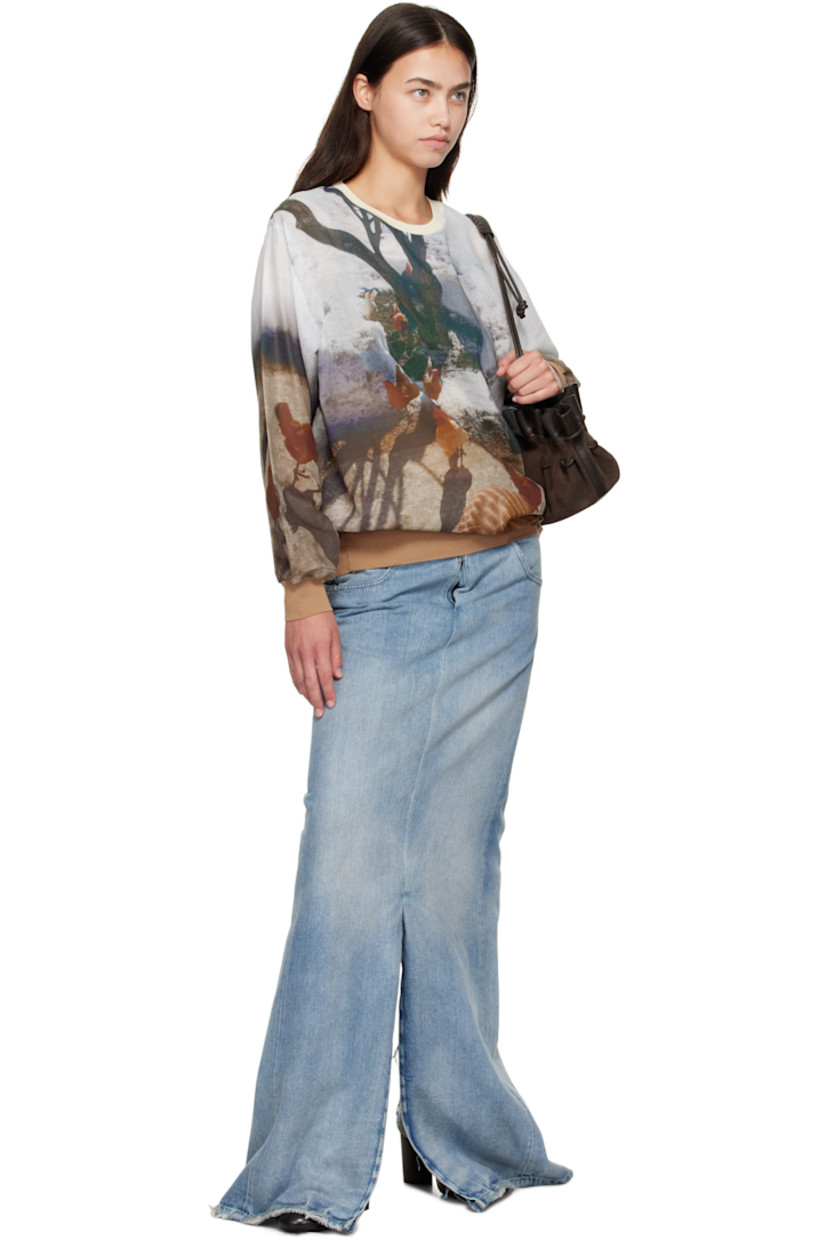 Semi-sheer cotton-blend poplin T-shirt.

· Graphic pattern printed throughout
· Rib-knit crewneck, hem, and cuffs
· Logo disc at side seam

Supplier color: Print