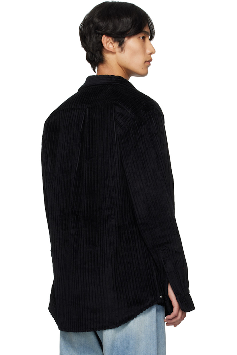Cotton-blend corduroy jacket.

· Modified shawl collar
· Extended wrap panel at front
· Button closure
· Patch pocket at chest
· Logo hardware at side seam
· Buttoned barrel cuffs
· Inverted box pleat at back yoke
· Unlined

Supplier color: Black Corduroy