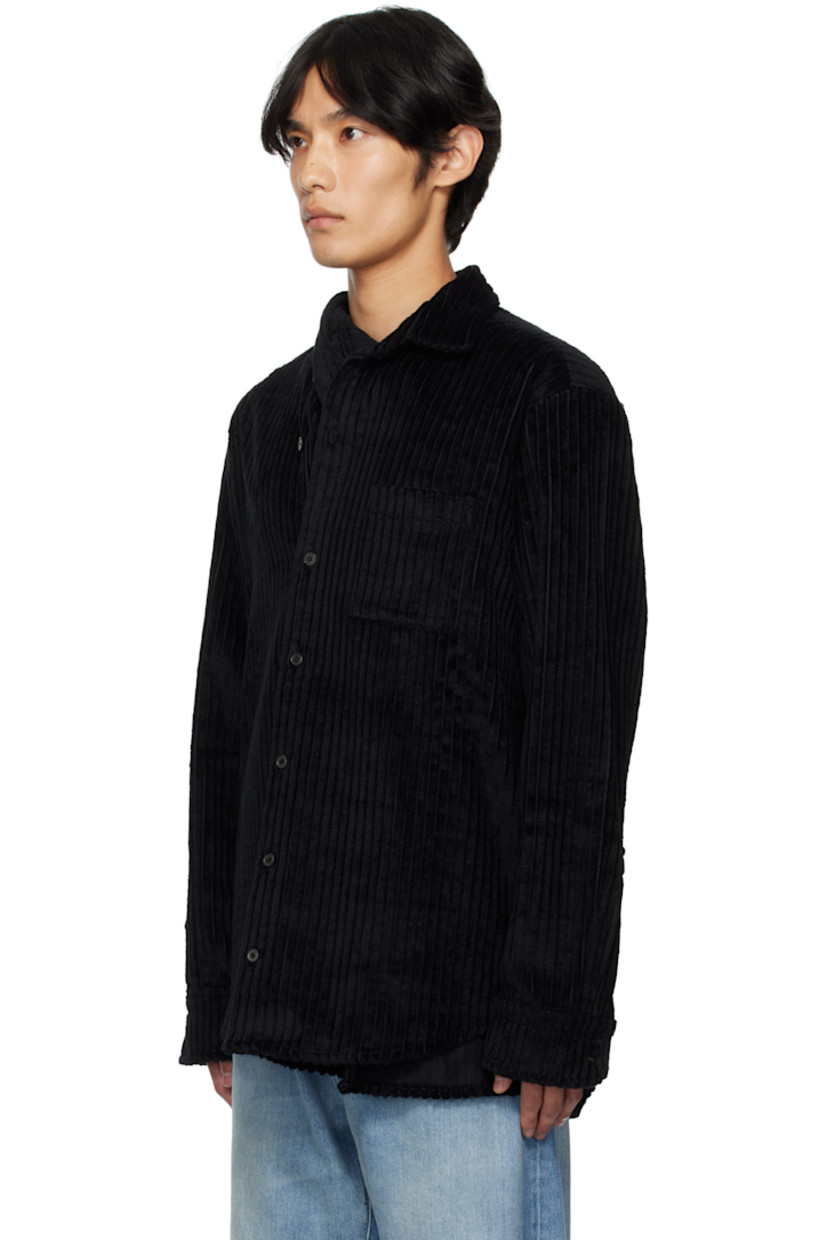 Cotton-blend corduroy jacket.

· Modified shawl collar
· Extended wrap panel at front
· Button closure
· Patch pocket at chest
· Logo hardware at side seam
· Buttoned barrel cuffs
· Inverted box pleat at back yoke
· Unlined

Supplier color: Black Corduroy