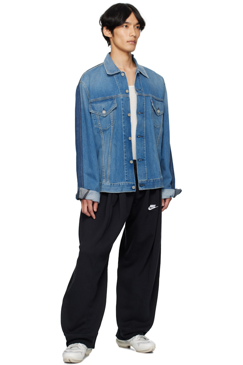 Upcycled cotton-blend fleece and non-stretch denim jeans.

· Drawstring and belt loops at partially elasticized waist
· Five-pocket styling
· Logo embroidered at front
· Logo patch at back waistband
· Logo flag at back pocket

Supplier color: Black/Denimblack