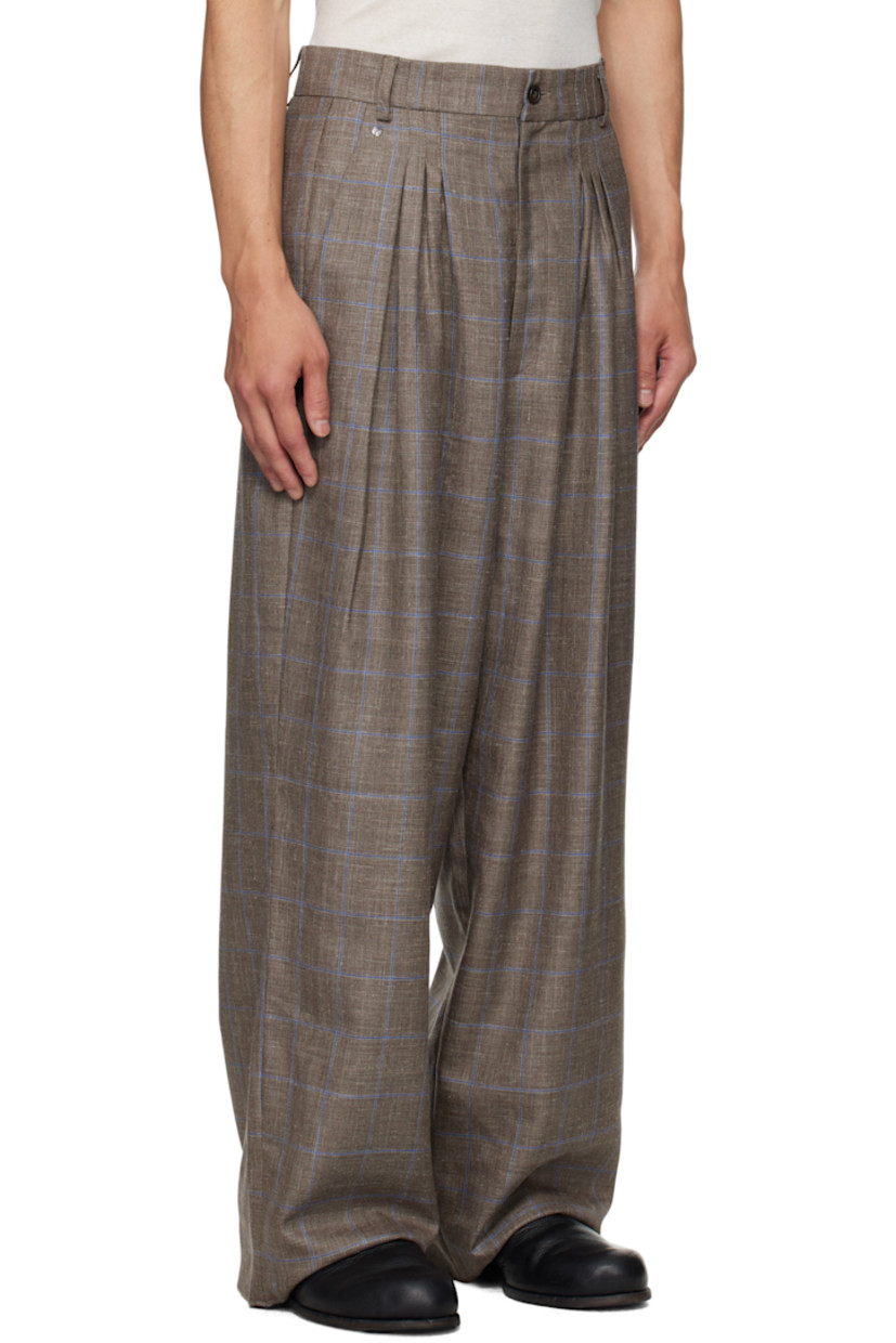 Wool- and silk-blend flannel trousers.

· Check pattern throughout
· Wide-leg
· Pleated waistband with belt loops
· Three-pocket styling
· Zip fly
· Pleats at front
· Logo hardware at front pocket
· Unfinished hem

Supplier color: Grey Blue Checks