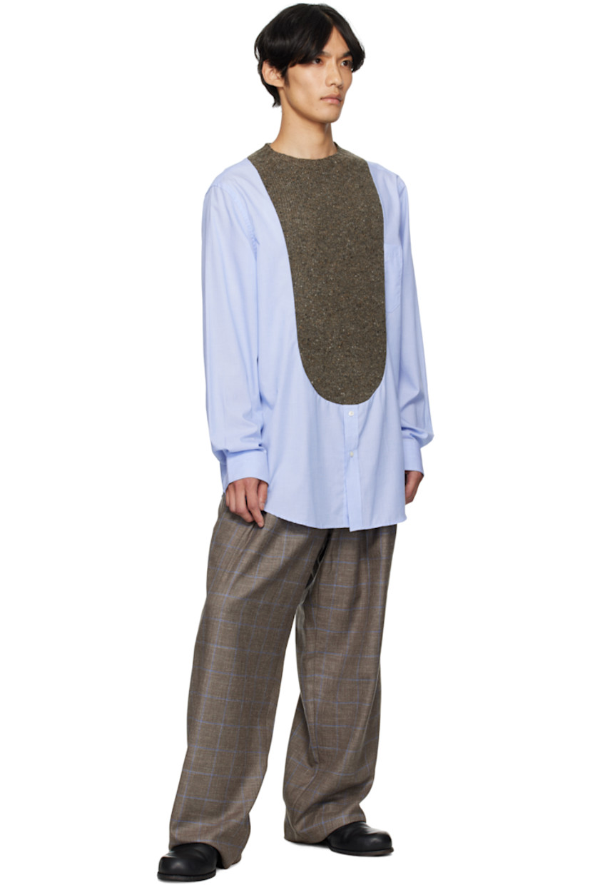 Wool- and silk-blend flannel trousers.

· Check pattern throughout
· Wide-leg
· Pleated waistband with belt loops
· Three-pocket styling
· Zip fly
· Pleats at front
· Logo hardware at front pocket
· Unfinished hem

Supplier color: Grey Blue Checks