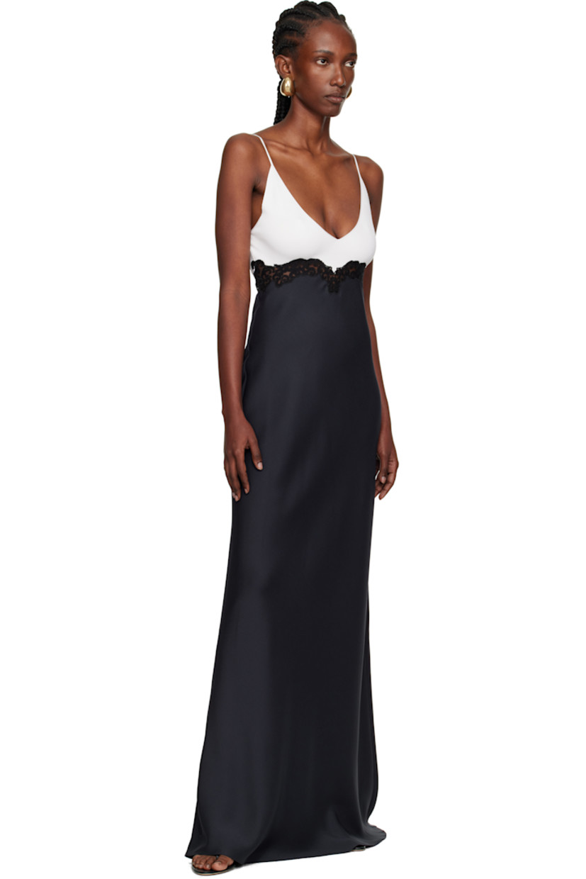Knit silk and cady maxi dress.

· Paneled construction 
· Plunging V-neck
· Floral lace trim at front and back waist
· Concealed zip closure at side seam
· Fixed spaghetti straps

Supplier color: Dark navy