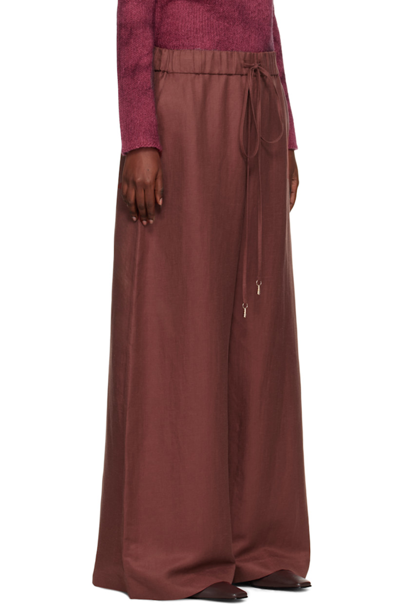 Linen- and silk-blend twill trousers.

· Wide-leg 
· Mid-rise
· Drawstring at elasticized waistband
· Two-pocket styling

Supplier color: Burnt sienna