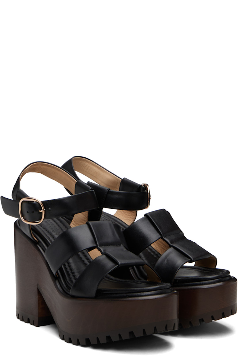 Buffed leather heeled sandals.

· Open almond toe
· Pin-buckle ankle strap
· Logo-embossed padded leather footbed
· Wooden block heel and platform midsole
· Treaded rubber sole
· Platform: H2"
· Heel: H4.25"

Supplier color: Black