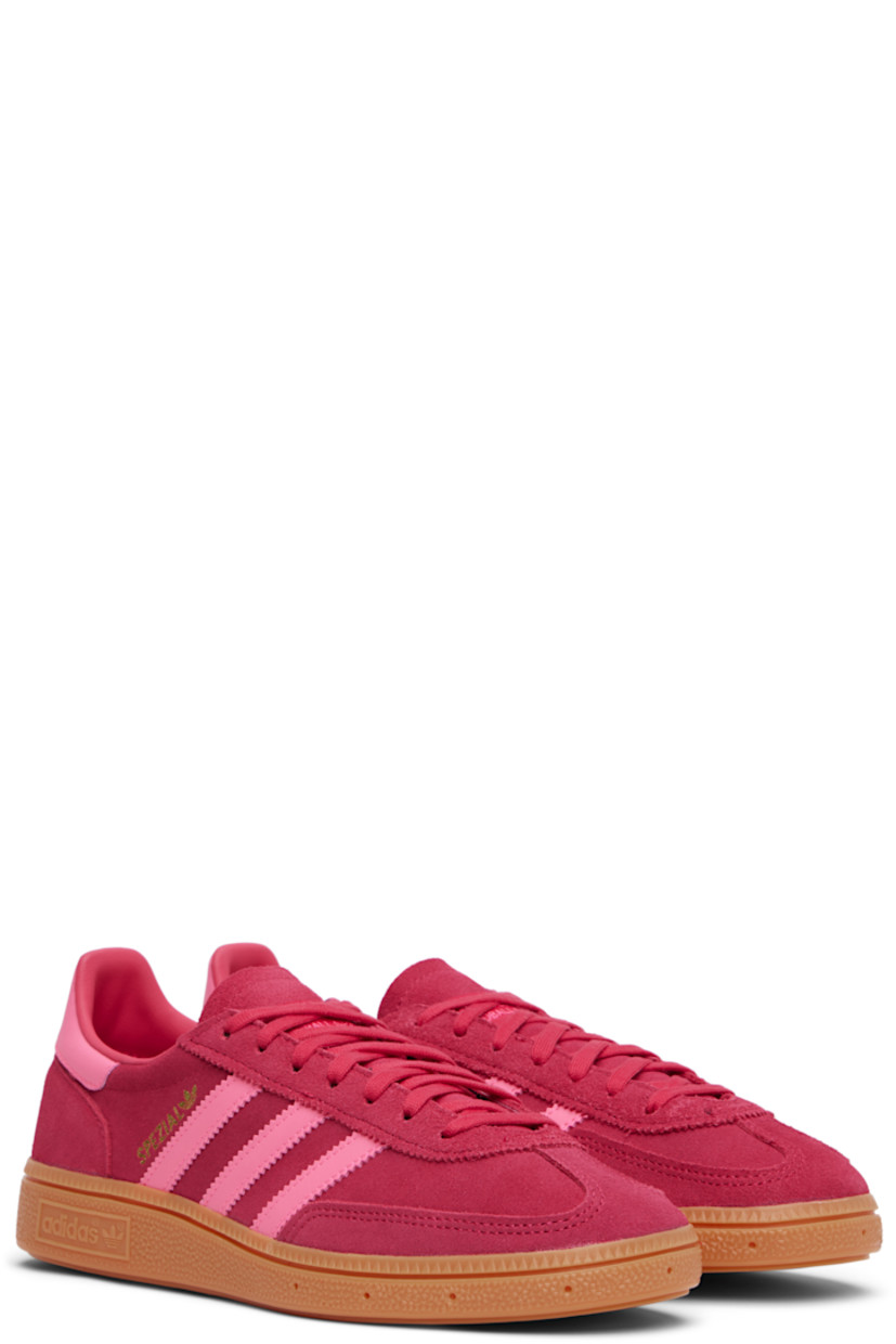 Low-top paneled suede and buffed faux-leather sneakers.

· Lace-up closure 
· Logo patch at padded tongue
· Padded collar
· Signature serrated stripes at sides
· Text and logo stamp at outer side
· Faux-leather lining
· Treaded rubber sole

Supplier color: Ruby red/Lucid pink/Gum 

adidas Kids US Size: child's foot length 
3.5Y: 8.5" / 21.6 cm 
4Y: 8.7" / 22.1 cm 
4.5Y: 8.9" / 22.5 cm 
5Y: 9" / 22.9 cm 
5.5Y: 9.2" / 23.3 cm 
6Y: 9.4" / 23.8 cm 
6.5Y: 9.5" / 24.2 cm 
7Y: 9.7" / 24.6 cm 
7.5Y: 9.8" / 25 cm
