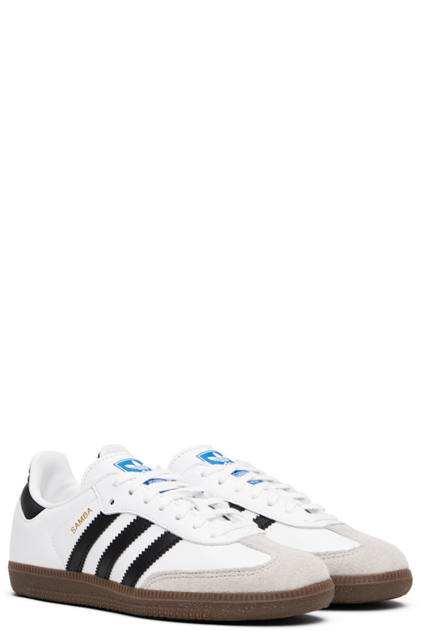 Low-top buffed leather sneakers.

· Suede trim at toe
· Lace-up closure 
· Logo printed at padded tongue
· Padded collar
· Signature serrated stripes at sides
· Text stamp at outer side
· Quilted heel tab
· OrthoLite® sockliner
· Faux-leather lining
· Treaded gum rubber sole

Supplier color: Cloud white/Core black/Gum

adidas Kids US Size: child's foot length 
3.5Y: 8.5" / 21.6 cm 
4Y: 8.7" / 22.1 cm 
4.5Y: 8.9" / 22.5 cm 
5Y: 9" / 22.9 cm 
5.5Y: 9.2" / 23.3 cm 
6Y: 9.4" / 23.8 cm 
6.5Y: 9.5" / 24.2 cm 
7Y: 9.7" / 24.6 cm 
7.5Y: 9.8" / 25 cm