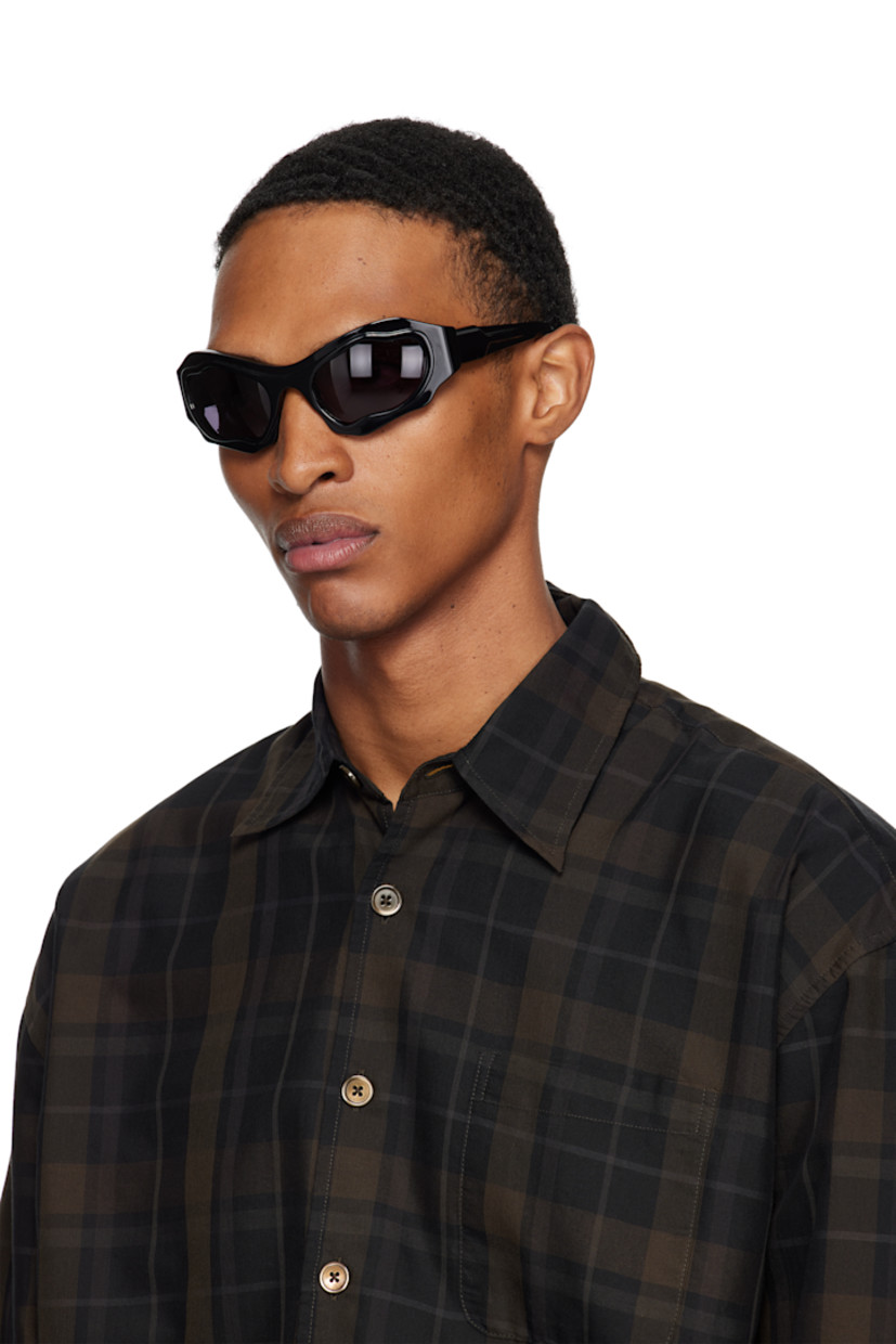 Sculptural cat-eye Mazzucchelli acetate-frame sunglasses.

· Handcrafted
· Gray lenses
· Integrated nose pads
· Includes case
· Size: 58.23 130

Supplier color: Black shine