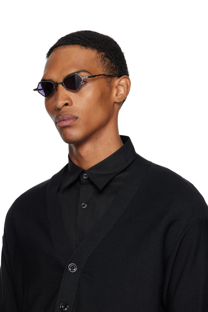 Handcrafted hexagonal metal-frame sunglasses.

· Engraved detailing throughout
· Purple lenses
· Adjustable metal nose pads
· Acetate temple tips
· Includes pouch
· Size: 45.25 145

Supplier color: Gunmetal