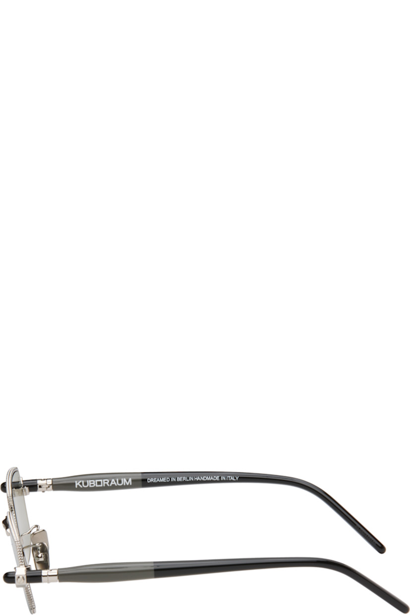 Handcrafted rectangular metal-frame sunglasses.

· Gray lenses
· Serrated detailing at rims
· Adjustable metal nose pads
· Acetate arms
· Includes case
· Size: 52.18 145

Supplier color: Silver/Grey/Black shine