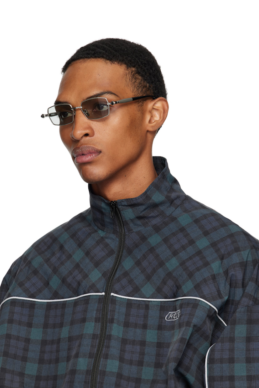 Handcrafted rectangular metal-frame sunglasses.

· Gray lenses
· Serrated detailing at rims
· Adjustable metal nose pads
· Acetate arms
· Includes case
· Size: 52.18 145

Supplier color: Silver/Grey/Black shine