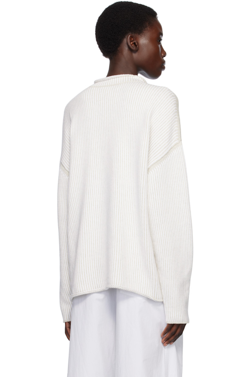 Hand-loomed knit pima cotton sweater. 

· Hand-dyed
· Rolled edge at crewneck, hem, and cuffs
· Vented side seams 
· Dropped shoulders

Supplier color: Marble/White