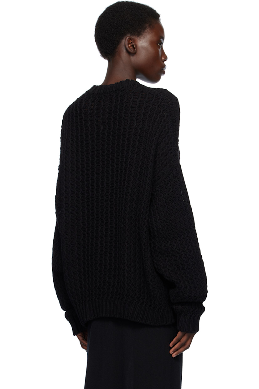 Knit pima cotton- and linen-blend sweater.

· Hand-loomed
· Rib-knit crewneck, hem, and cuffs

Supplier color: Black