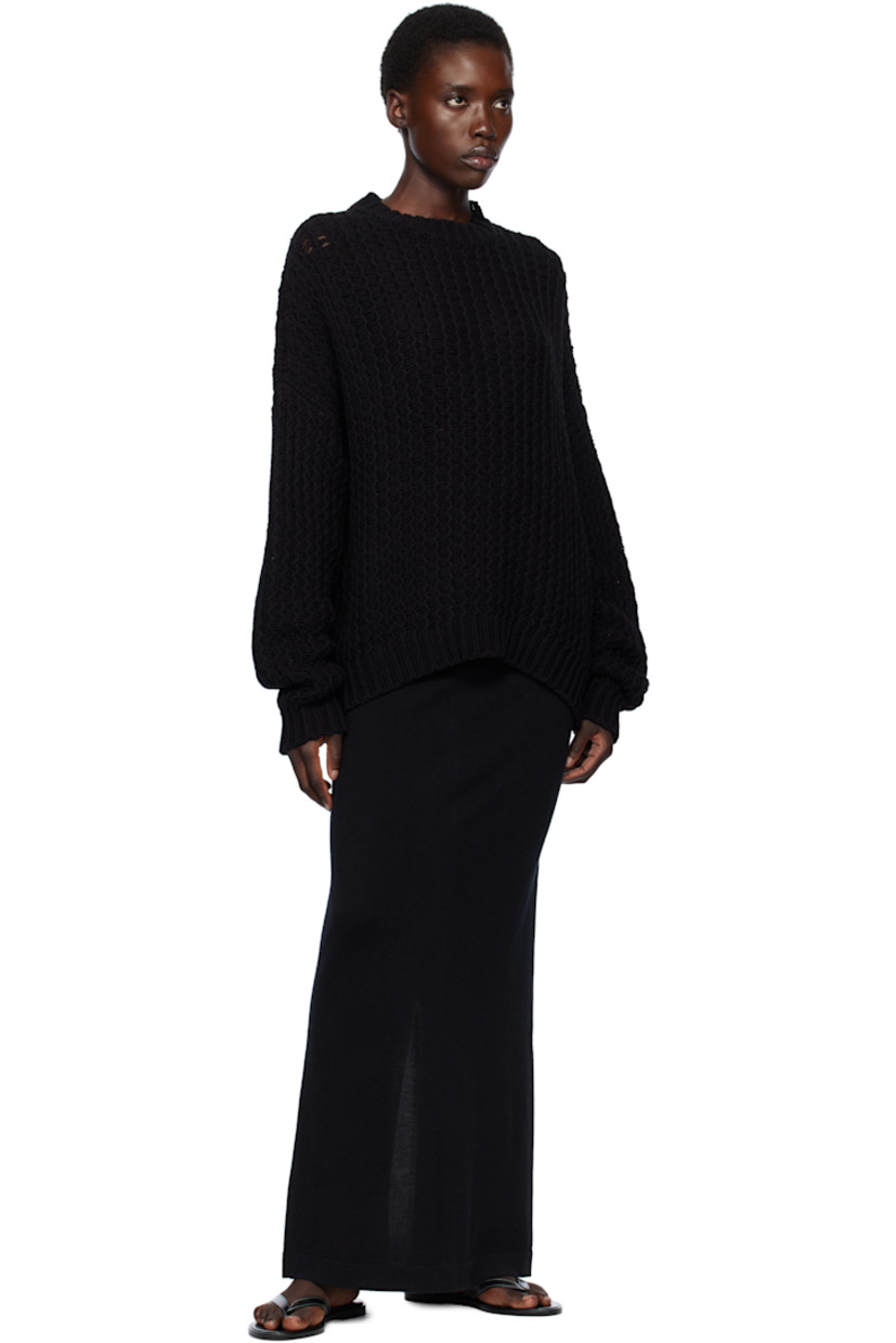 Knit pima cotton- and linen-blend sweater.

· Hand-loomed
· Rib-knit crewneck, hem, and cuffs

Supplier color: Black
