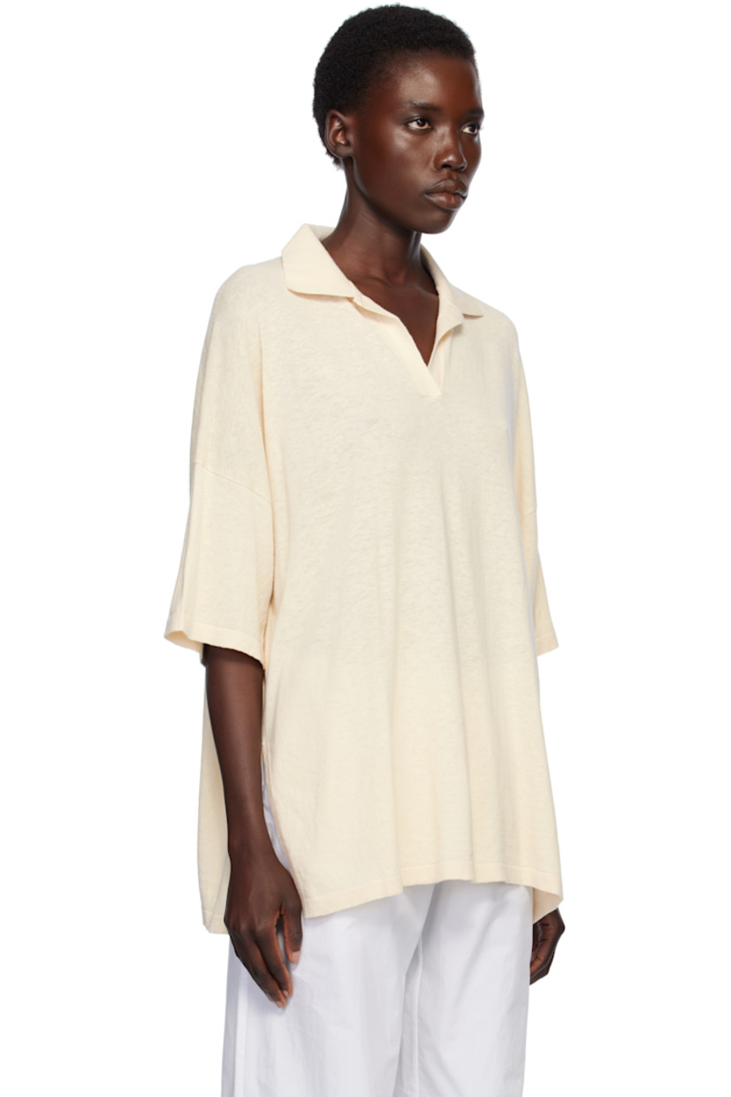 Knit pima cotton- and linen-blend polo. 

· Rib-knit open spread collar and cuffs
· Vented side seams
· Dropped shoulders

Supplier color: Ivory