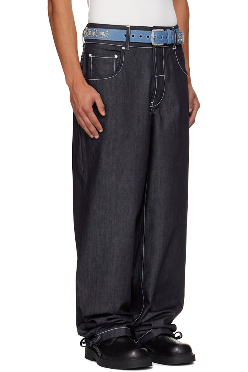 10 oz non-stretch denim jeans.

· Wide-leg 
· Belt loops
· Five-pocket styling
· Zip fly 
· Self-tie drawstring at cuffs
· Contrast stitching in white

Available exclusively at SSENSE.

Supplier color: Denim