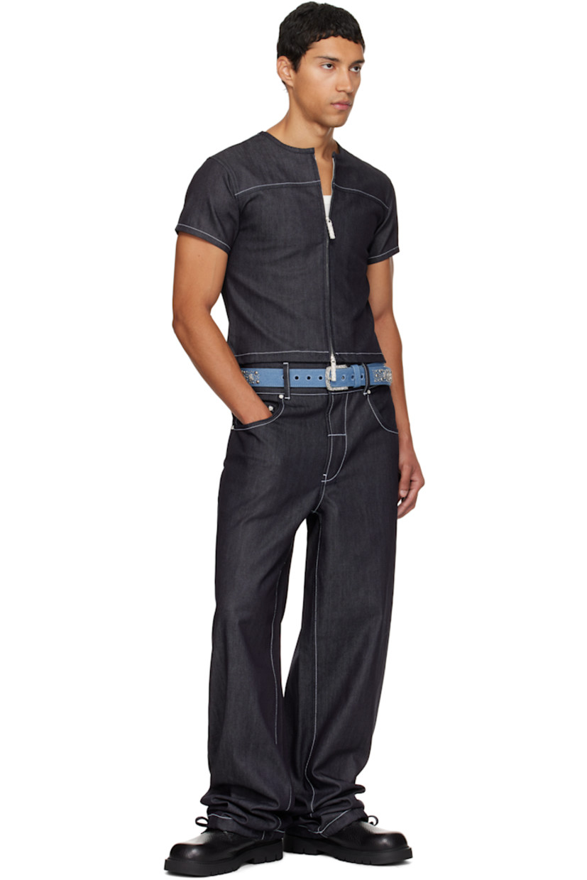 10 oz non-stretch denim jeans.

· Wide-leg 
· Belt loops
· Five-pocket styling
· Zip fly 
· Self-tie drawstring at cuffs
· Contrast stitching in white

Available exclusively at SSENSE.

Supplier color: Denim
