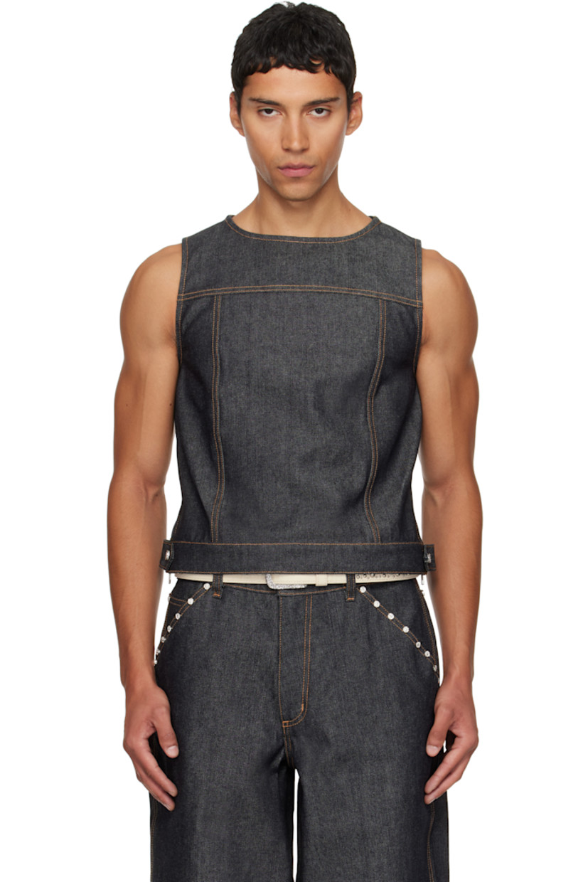 Non-stretch denim vest. 

· Round neck
· Press-stud tab at hem 
· Zip vent at side seams 
· Contrast stitching in tan 

Available exclusively at SSENSE.

Supplier color: Denim