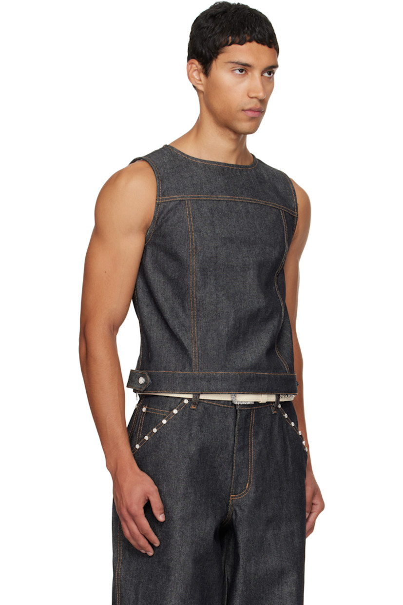 Non-stretch denim vest. 

· Round neck
· Press-stud tab at hem 
· Zip vent at side seams 
· Contrast stitching in tan 

Available exclusively at SSENSE.

Supplier color: Denim