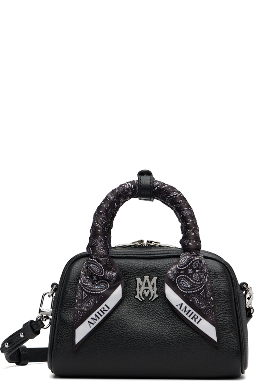 Pebble-grained leather top handle bag.

· Press-stud tab at bandana-wrapped twin carry handles
· Adjustable and detachable crossbody strap
· Logo hardware at face
· Two-way zip closure
· Card slot at interior
· Logo-woven lining
· Logo-engraved silver-tone hardware
· H4.5" x W7.25" x D3"

Supplier color: Black