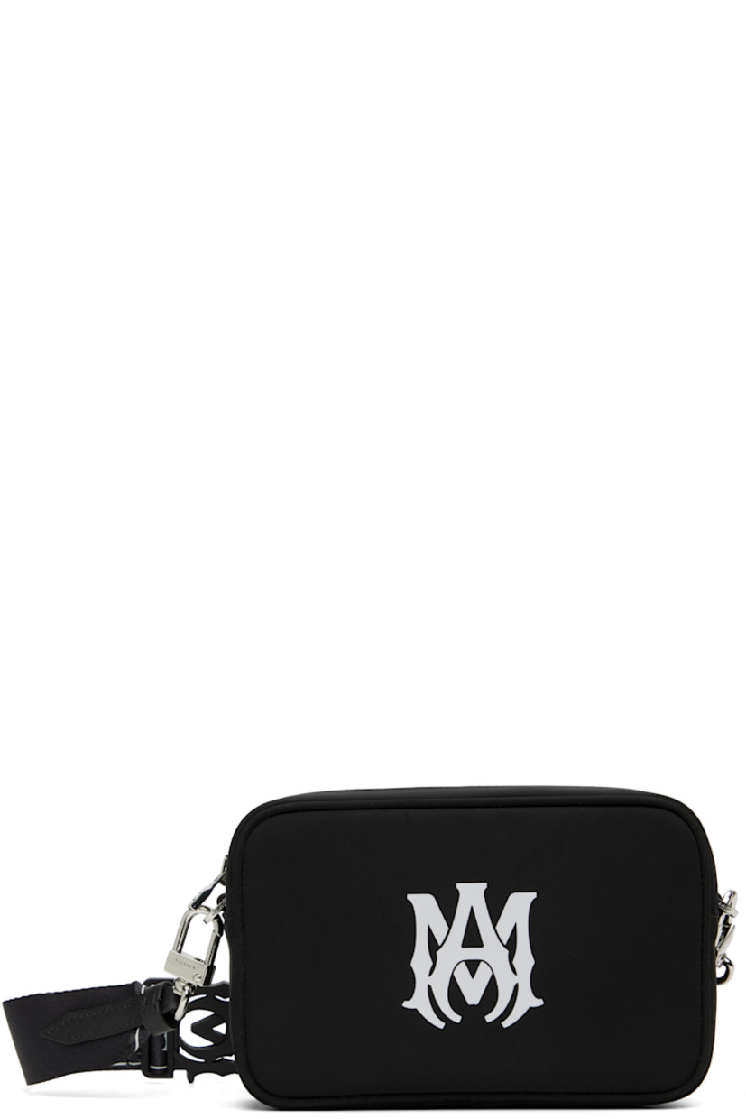 Nylon twill shoulder bag.

· Adjustable and detachable logo-woven shoulder strap
· Logo press-release fastening at strap
· Logo bonded at face
· Zip closure
· Logo-woven lining
· Logo-engraved silver-tone hardware
· H5" x W7.5" x D2"

Part of the Core collection.

Supplier color: Black