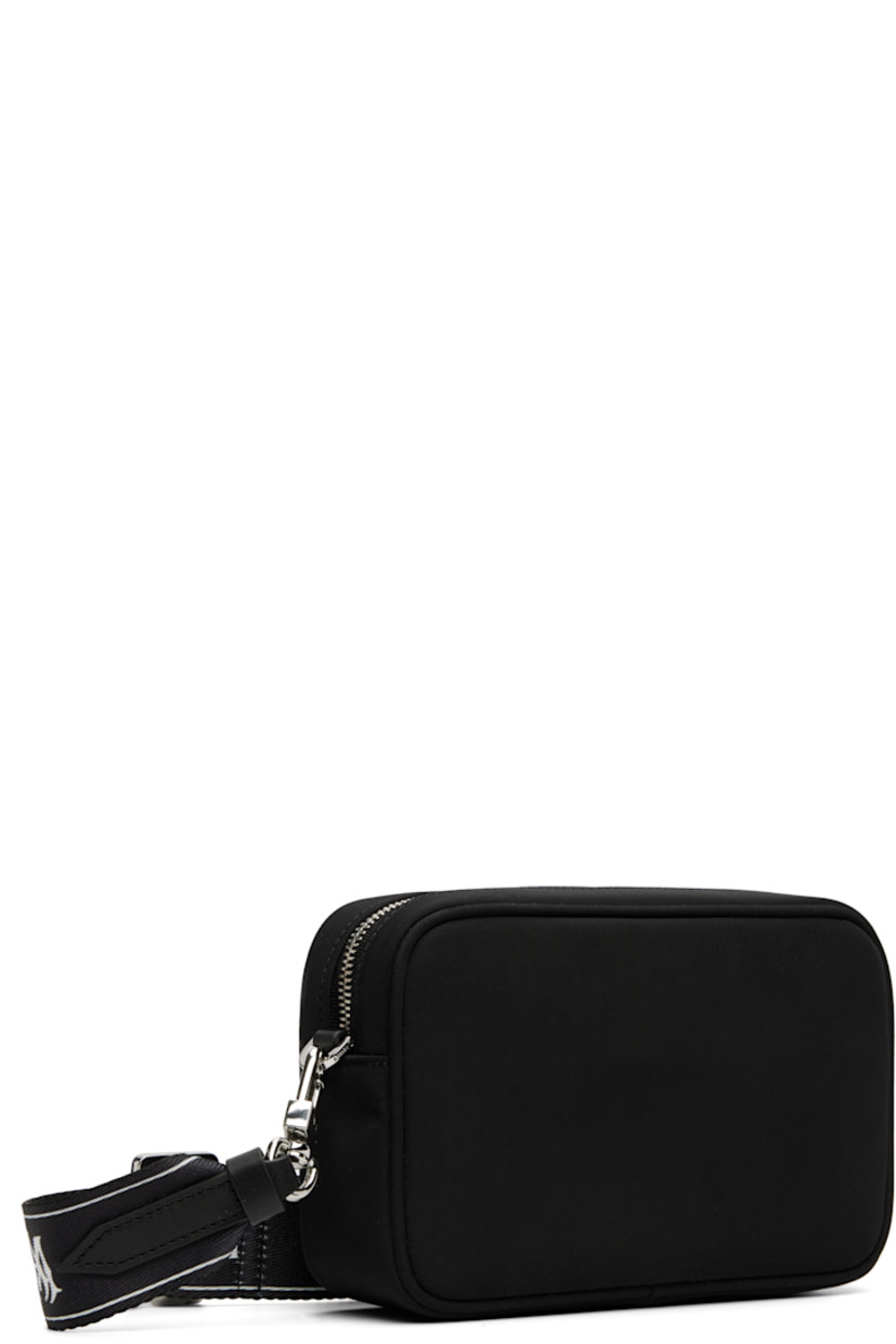 Nylon twill shoulder bag.

· Adjustable and detachable logo-woven shoulder strap
· Logo press-release fastening at strap
· Logo bonded at face
· Zip closure
· Logo-woven lining
· Logo-engraved silver-tone hardware
· H5" x W7.5" x D2"

Part of the Core collection.

Supplier color: Black