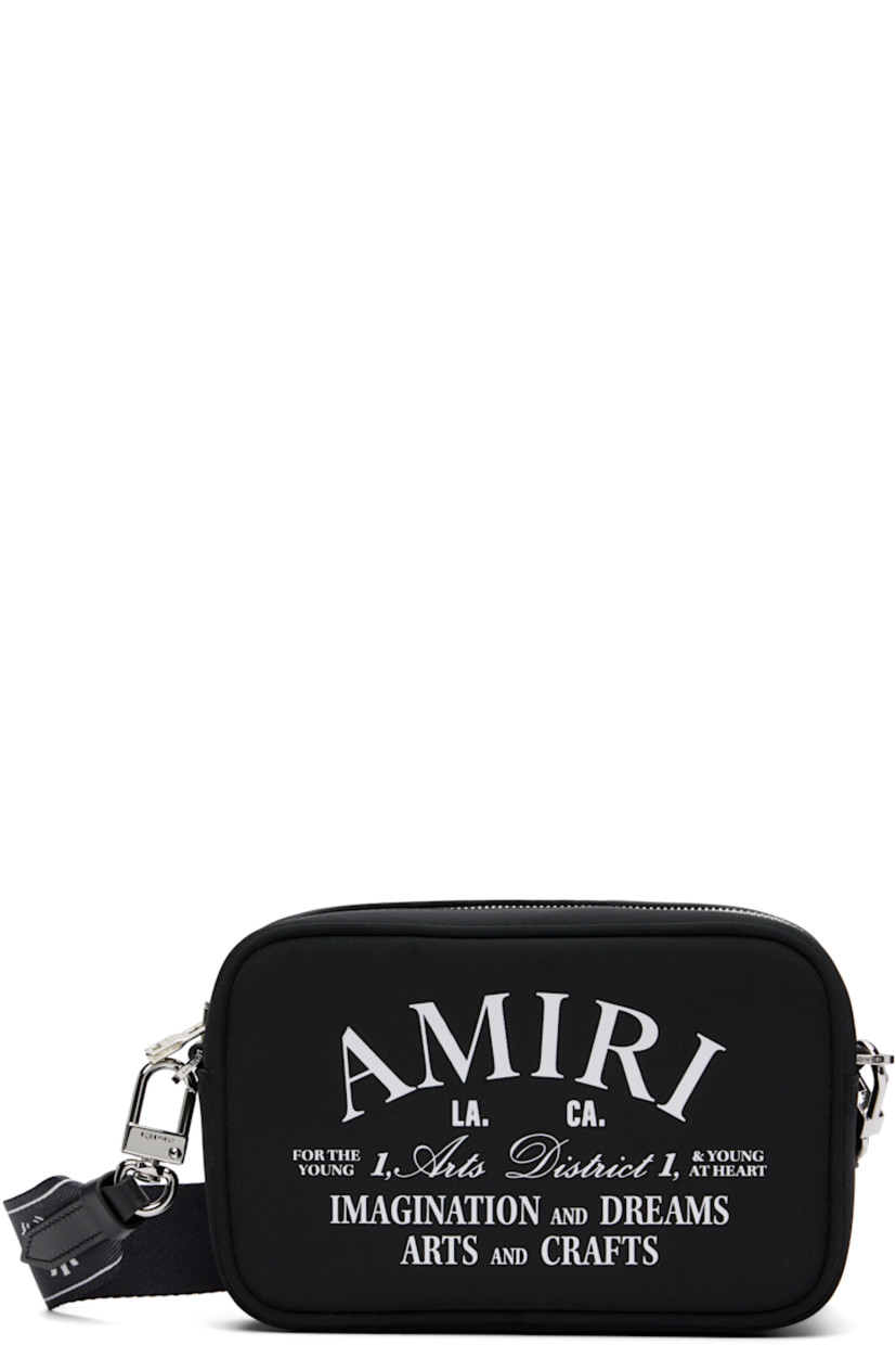 Nylon twill shoulder bag.

· Adjustable and detachable logo-woven shoulder strap
· Logo press-release fastening at strap
· Logo and text printed at face
· Zip closure
· Logo-woven lining
· Logo-engraved silver-tone hardware
· H5" x W7.5" x D2"

Part of the Core collection.

Supplier color: Black
