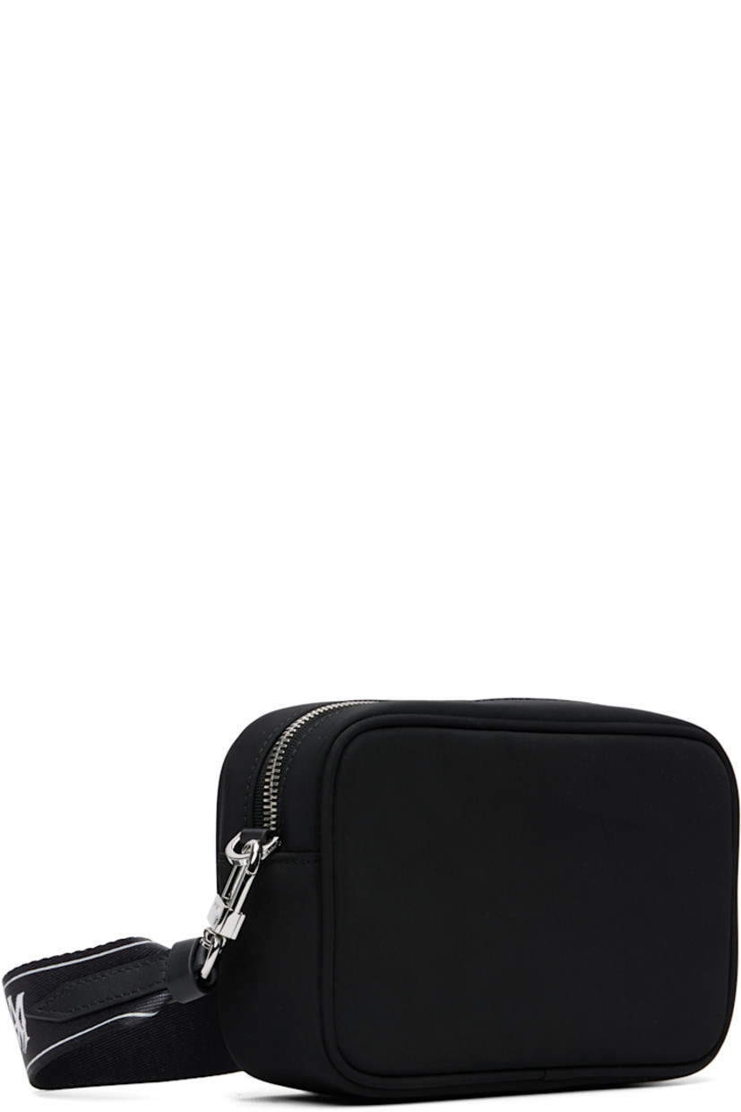 Nylon twill shoulder bag.

· Adjustable and detachable logo-woven shoulder strap
· Logo press-release fastening at strap
· Logo and text printed at face
· Zip closure
· Logo-woven lining
· Logo-engraved silver-tone hardware
· H5" x W7.5" x D2"

Part of the Core collection.

Supplier color: Black