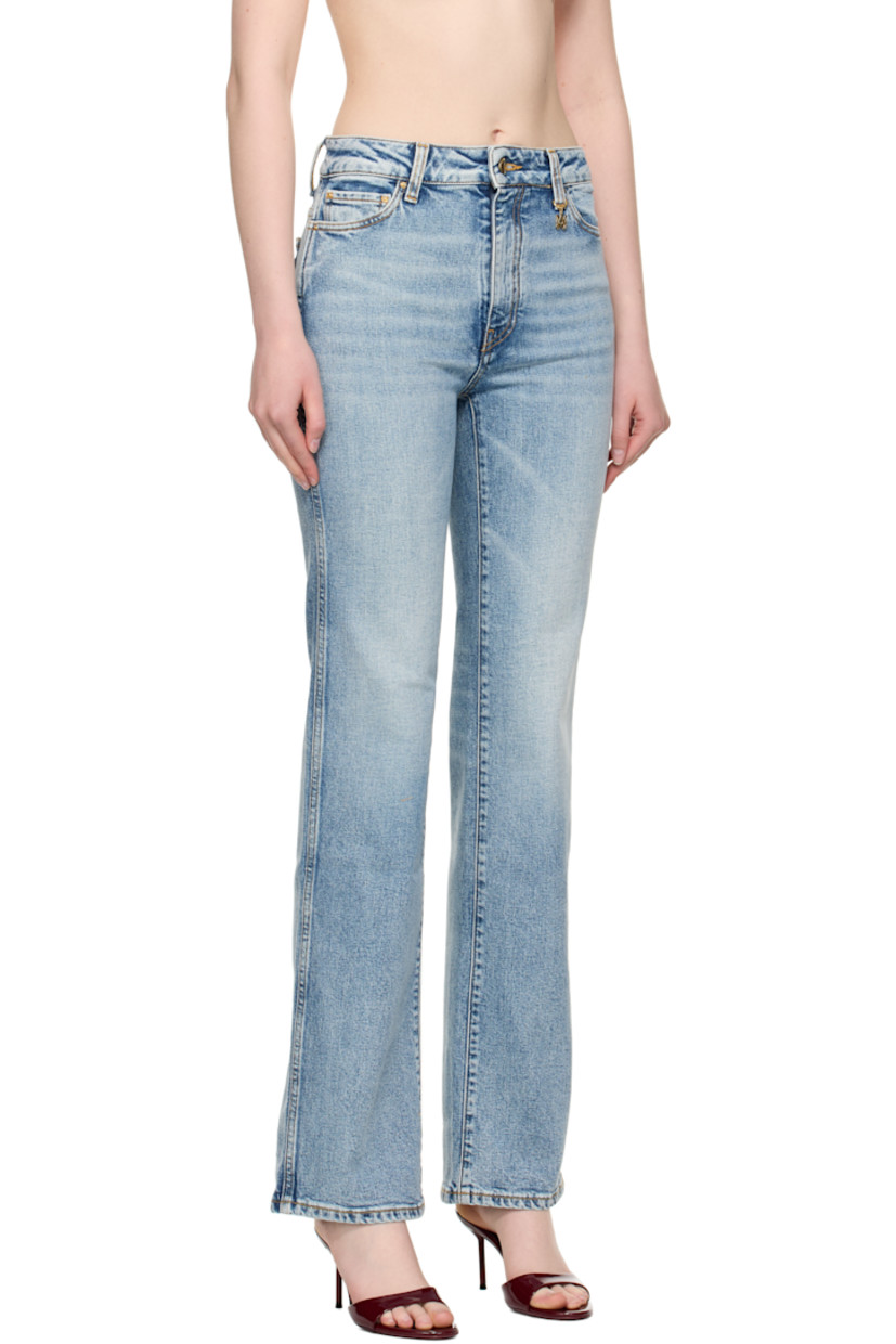 Stonewashed stretch denim jeans. 

· Slim-fit
· Belt loops
· D-ring logo hardware at front waist
· Five-pocket styling
· Zip fly 
· Logo patch at back waistband
· Logo hardware at back pocket
· Gold-tone hardware
· Contrast stitching in tan 

Supplier color: Stone indigo