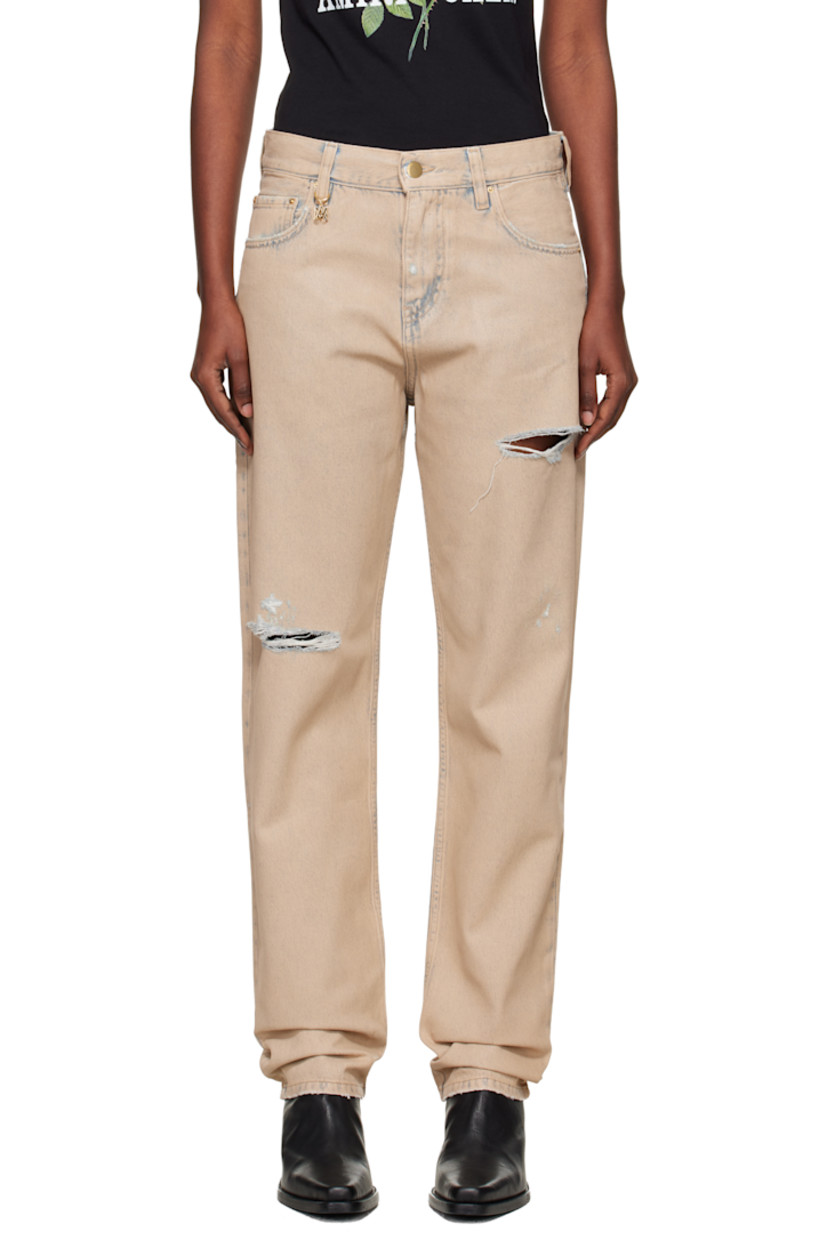 Non-stretch denim jeans.

· Fading and distressing throughout
· Belt loops
· Five-pocket styling
· Button fly
· Logo charm at front waistband
· Logo patch at back waistband
· Logo plaque at back pocket

Supplier color: Indigo desert