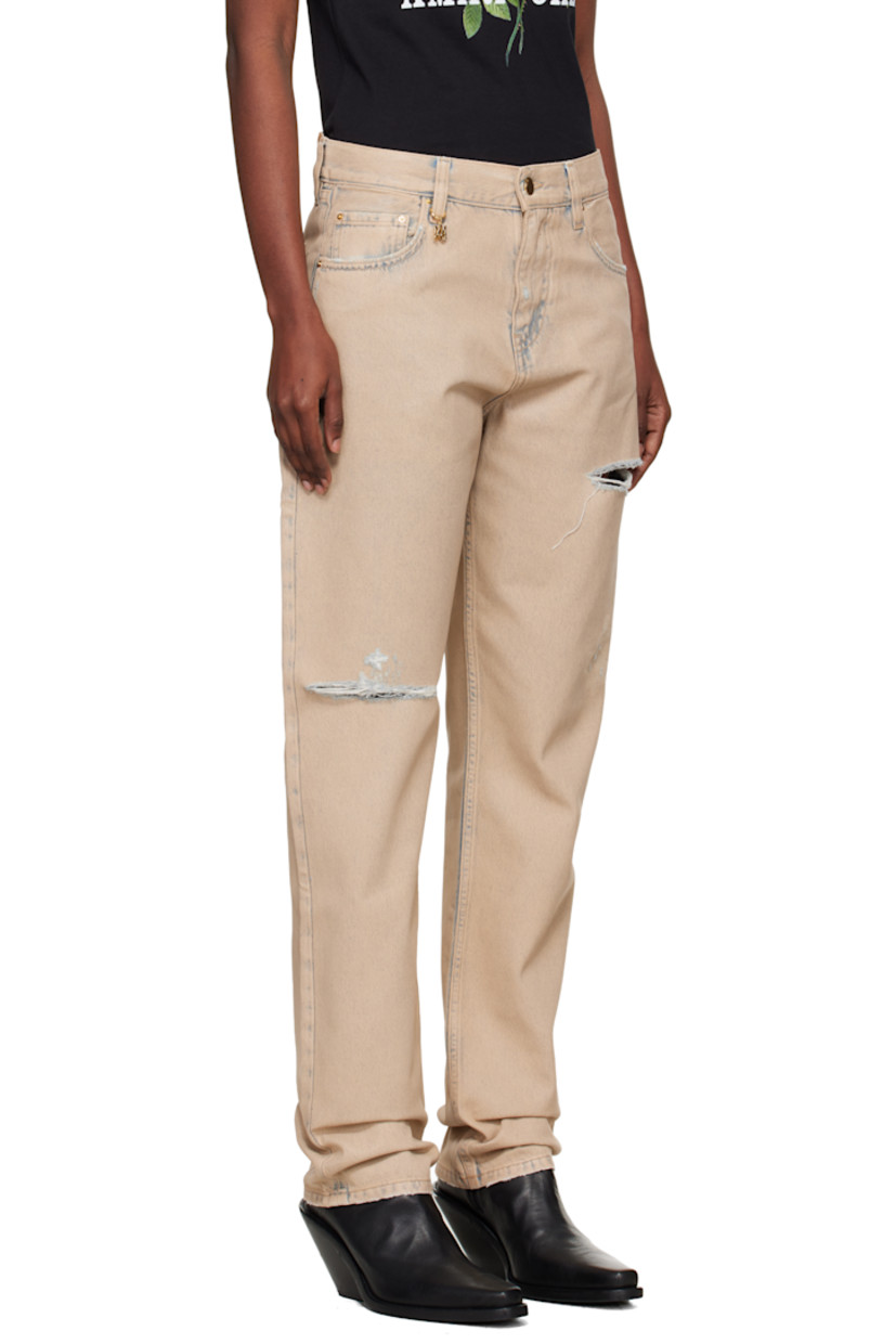 Non-stretch denim jeans.

· Fading and distressing throughout
· Belt loops
· Five-pocket styling
· Button fly
· Logo charm at front waistband
· Logo patch at back waistband
· Logo plaque at back pocket

Supplier color: Indigo desert
