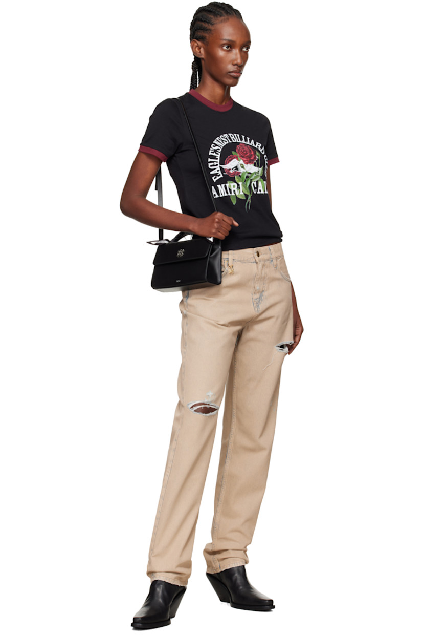 Non-stretch denim jeans.

· Fading and distressing throughout
· Belt loops
· Five-pocket styling
· Button fly
· Logo charm at front waistband
· Logo patch at back waistband
· Logo plaque at back pocket

Supplier color: Indigo desert