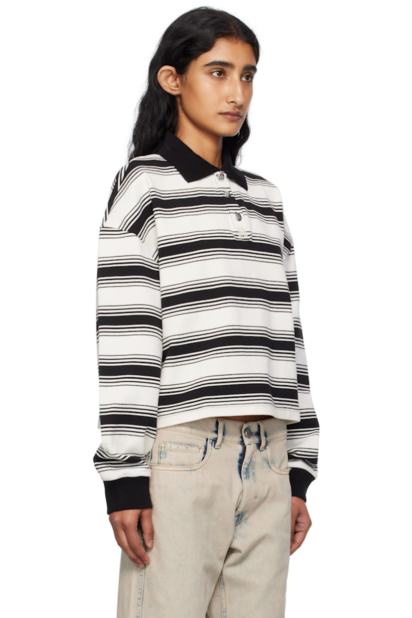 Knit cotton polo.

· Striped pattern throughout
· Rib-knit spread collar and cuffs
· Three-button placket with logo hardware
· Dropped shoulders

Supplier color: Ivory/Black