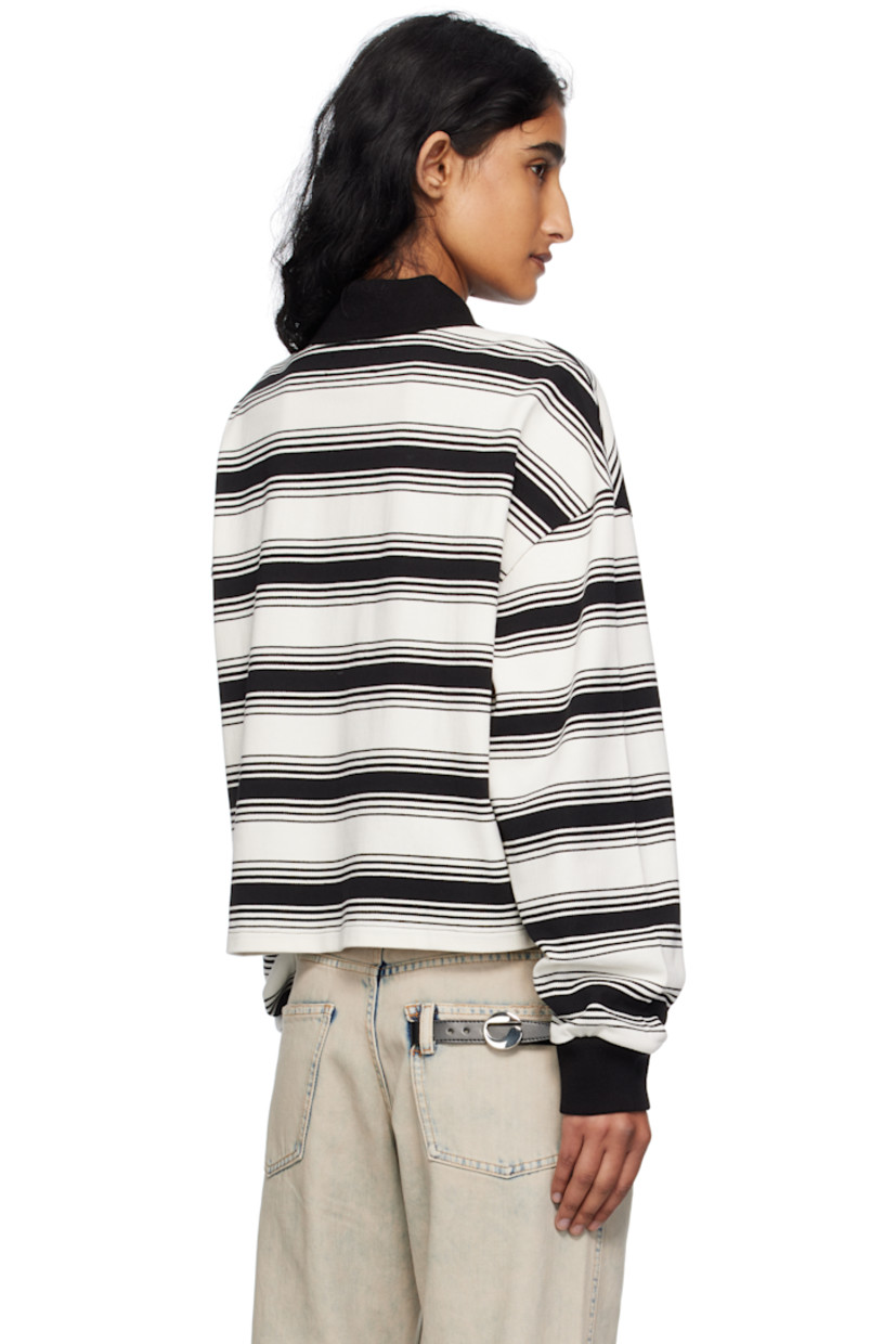 Knit cotton polo.

· Striped pattern throughout
· Rib-knit spread collar and cuffs
· Three-button placket with logo hardware
· Dropped shoulders

Supplier color: Ivory/Black