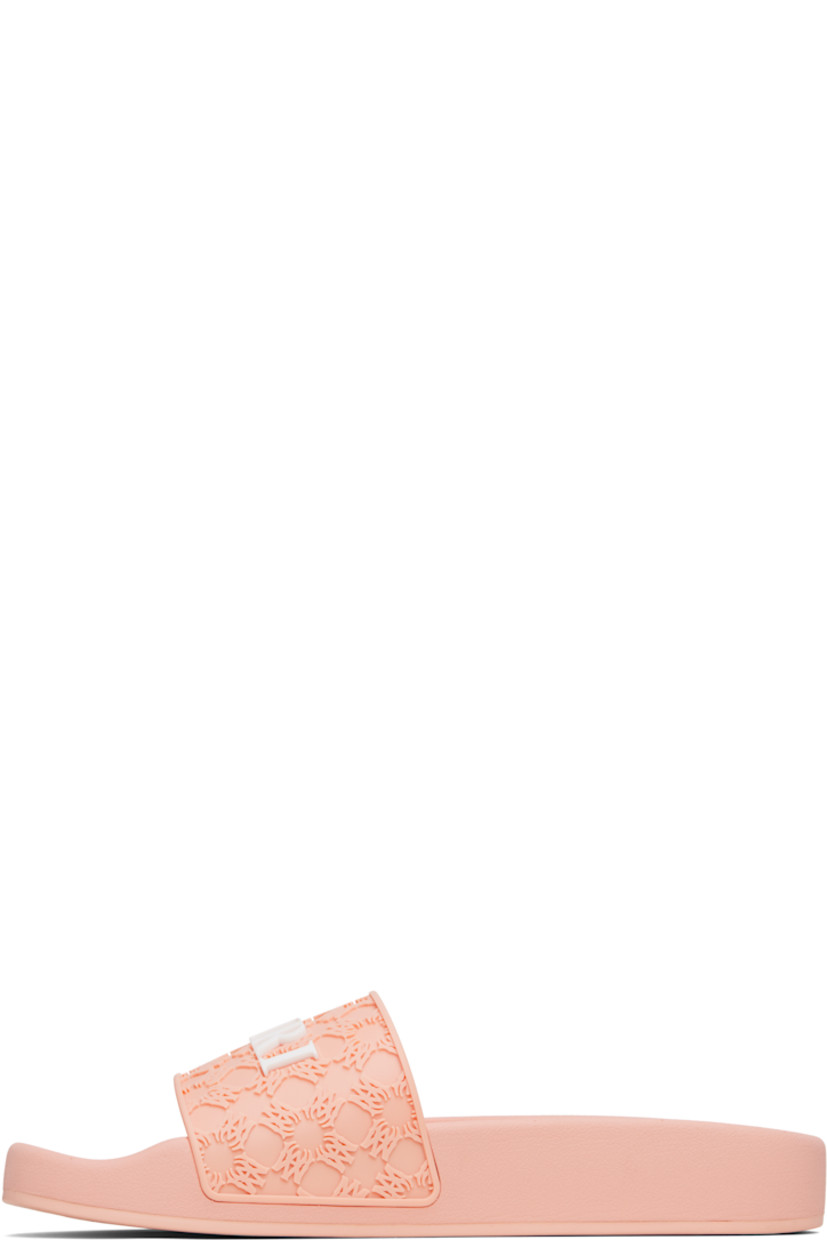 Foam rubber pool slides.

· Open square toe 
· Strap with logo pattern embossed at vamp
· Rubberized logo at strap
· Molded rubber footbed
· Logo embossed at midsole 
· Rubber sole 

Supplier color: Evening sand