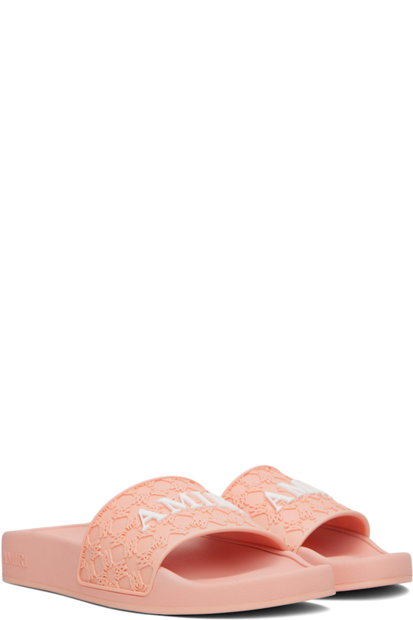 Foam rubber pool slides.

· Open square toe 
· Strap with logo pattern embossed at vamp
· Rubberized logo at strap
· Molded rubber footbed
· Logo embossed at midsole 
· Rubber sole 

Supplier color: Evening sand