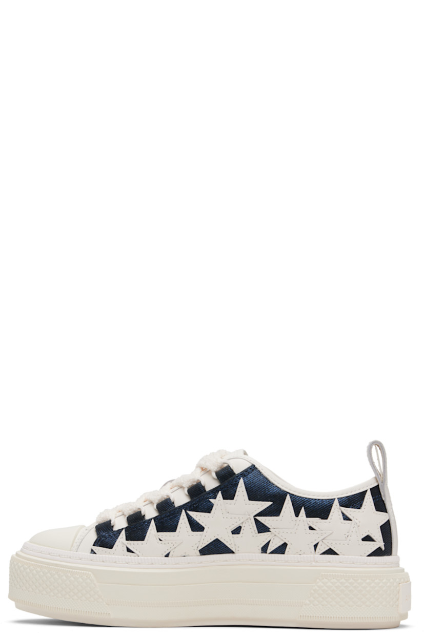 Low-top twill and buffed leather sneakers. 

· Rubber cap toe
· Lace-up closure
· Logo embossed at tongue 
· Graphic appliqués at sides
· Pull-loop at heel collar
· Mesh lining
· Logo-embossed textured rubber midsole
· Treaded rubber sole

Supplier color: Wet shimmer