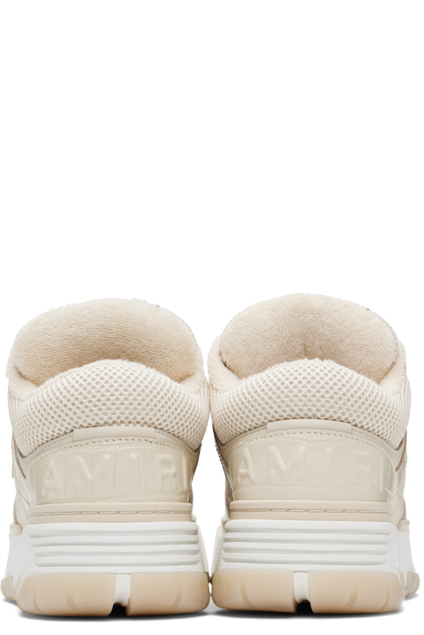 Low-top mesh and croc-embossed leather sneakers.

· Perforations at toe
· Lace-up closure
· Logo patch at padded tongue
· Padded collar
· Logo appliqué at outer side
· Logo embossed at heel counter and midsole
· Terrycloth lining
· Treaded rubber sole

Supplier color: Alabaster