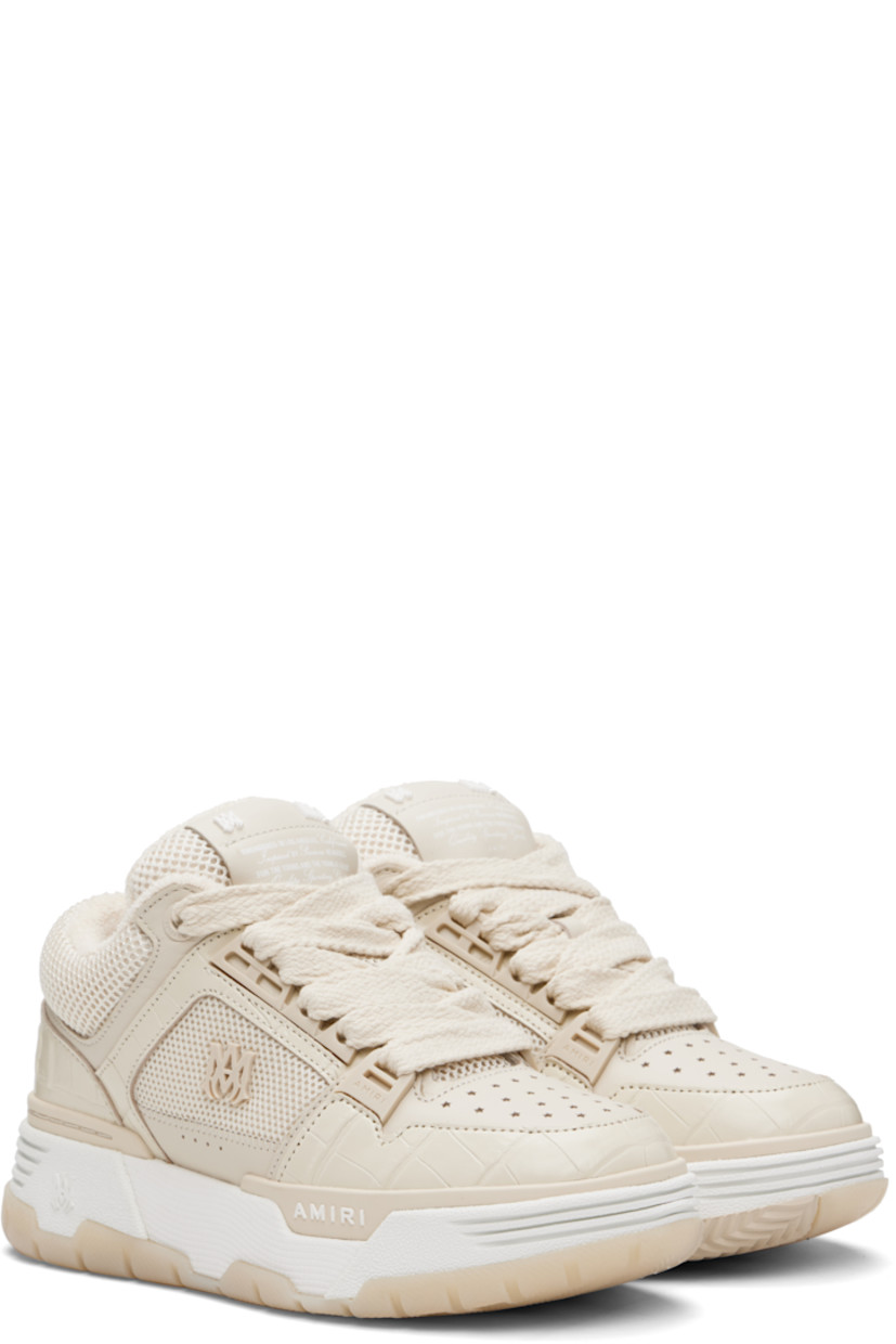 Low-top mesh and croc-embossed leather sneakers.

· Perforations at toe
· Lace-up closure
· Logo patch at padded tongue
· Padded collar
· Logo appliqué at outer side
· Logo embossed at heel counter and midsole
· Terrycloth lining
· Treaded rubber sole

Supplier color: Alabaster